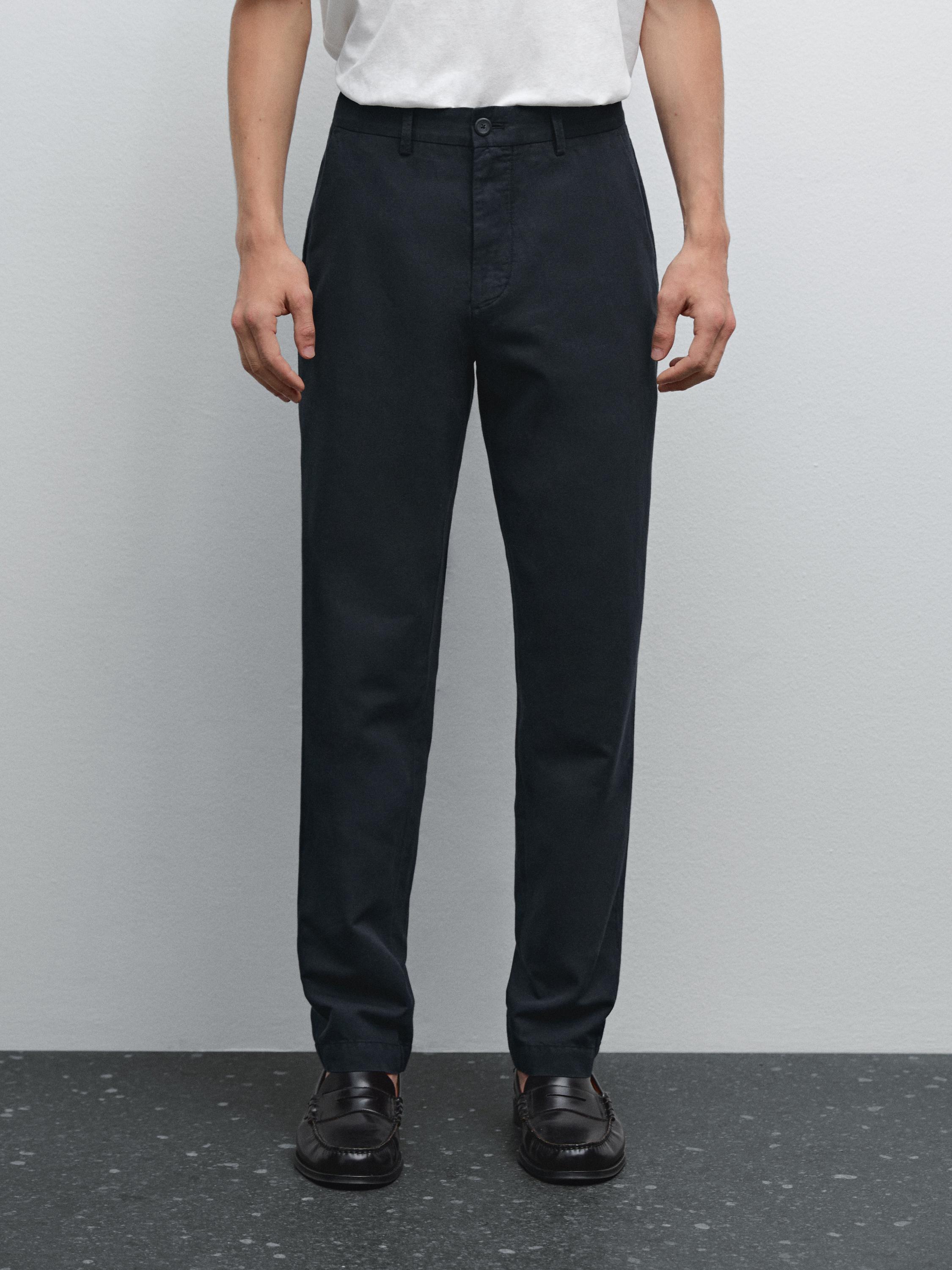 Pantalón tappered fit con algodón y lino