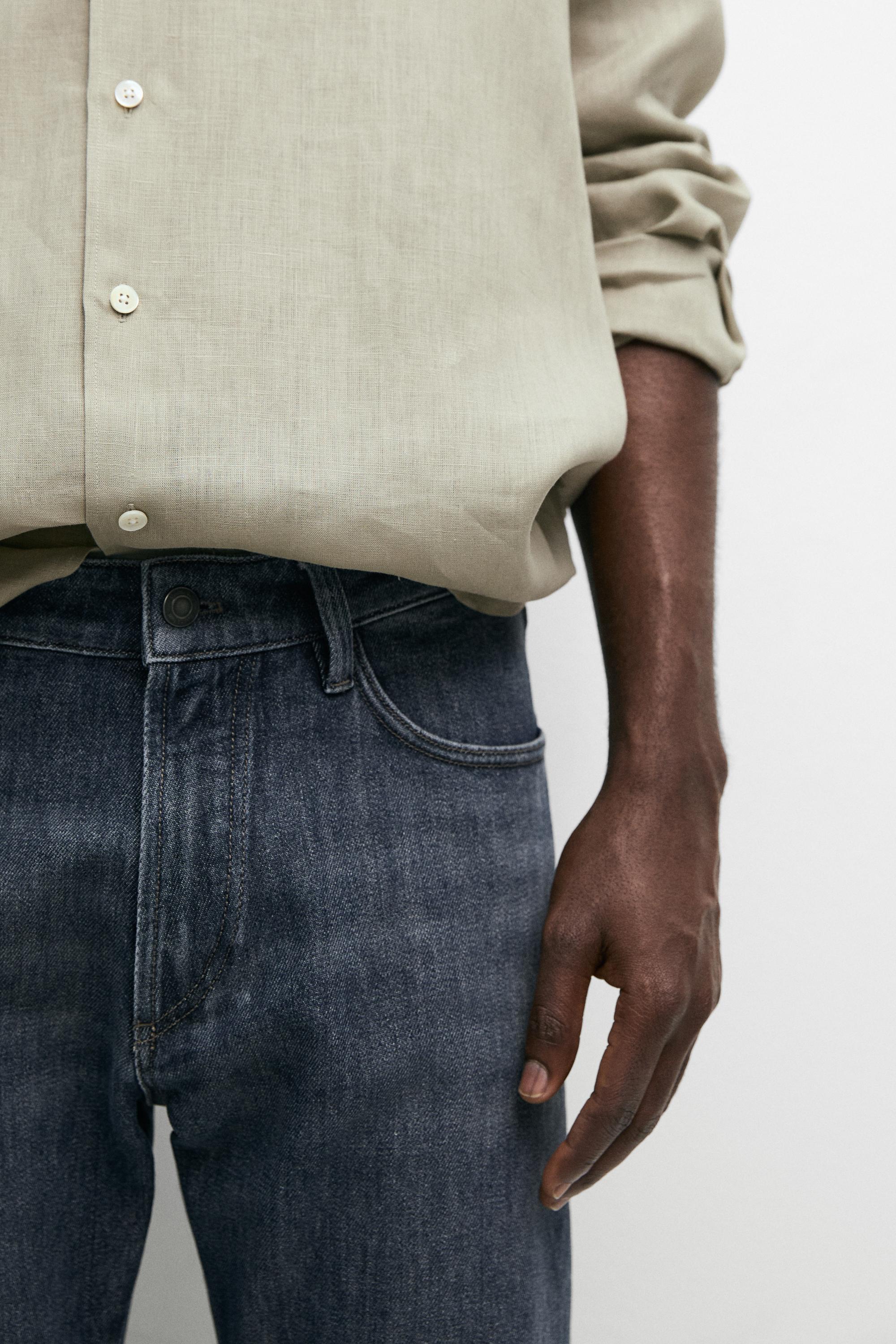 Enzymatic tapered fit jeans — DEEP BLUE