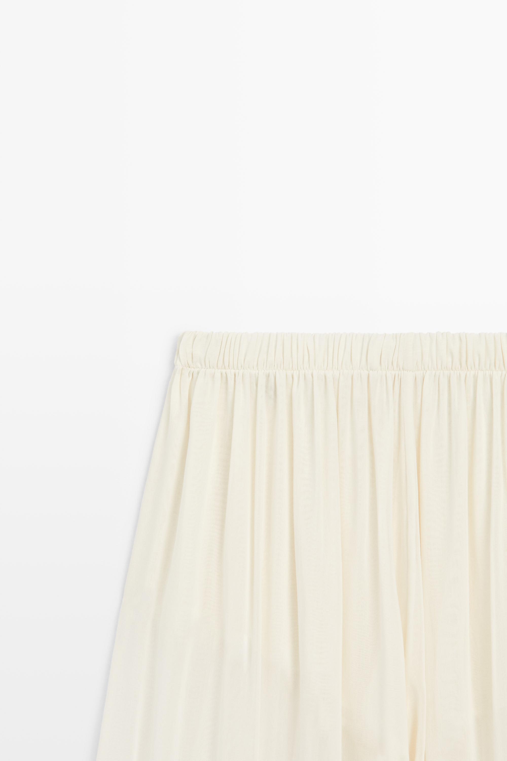 Semi-sheer flowing wide-leg pants — Off white