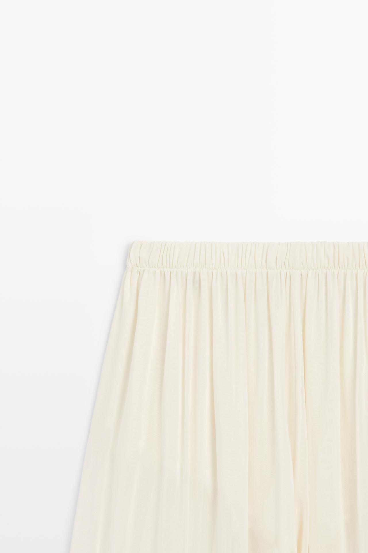Semi-sheer flowing wide-leg pants — Off white