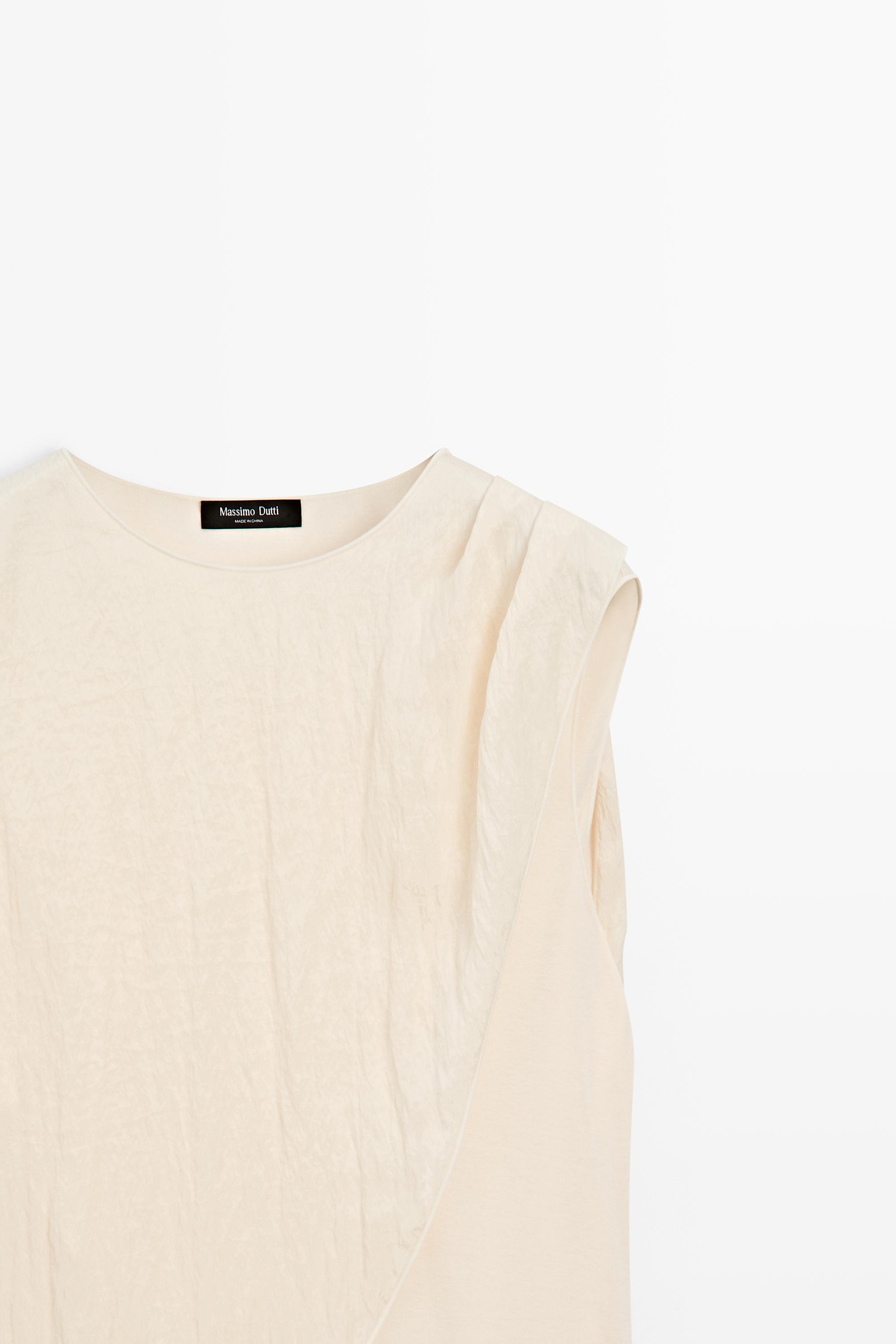 Crossover top with shoulder scarf detail — CREAM