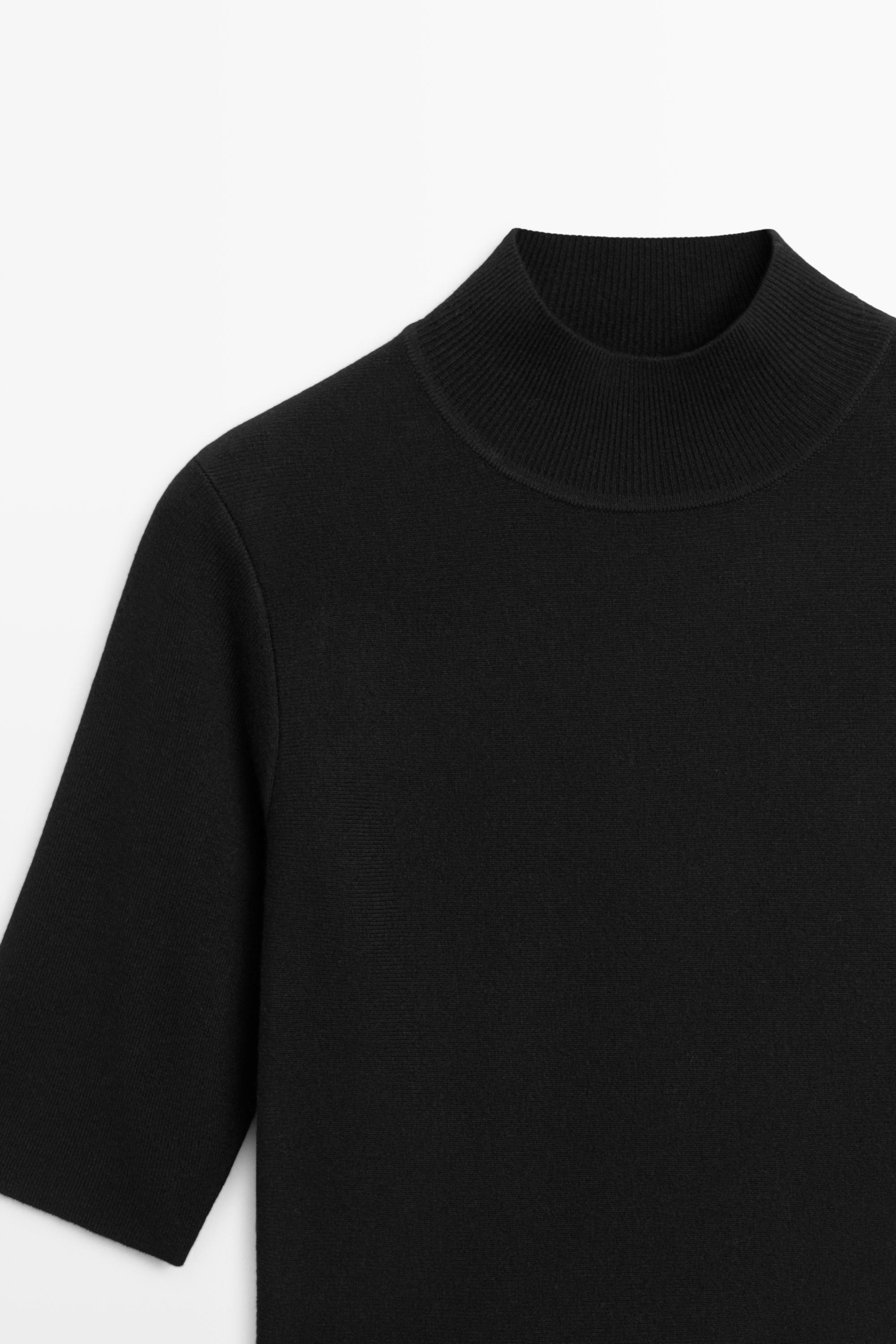 Peplum detail knit top — BLACK