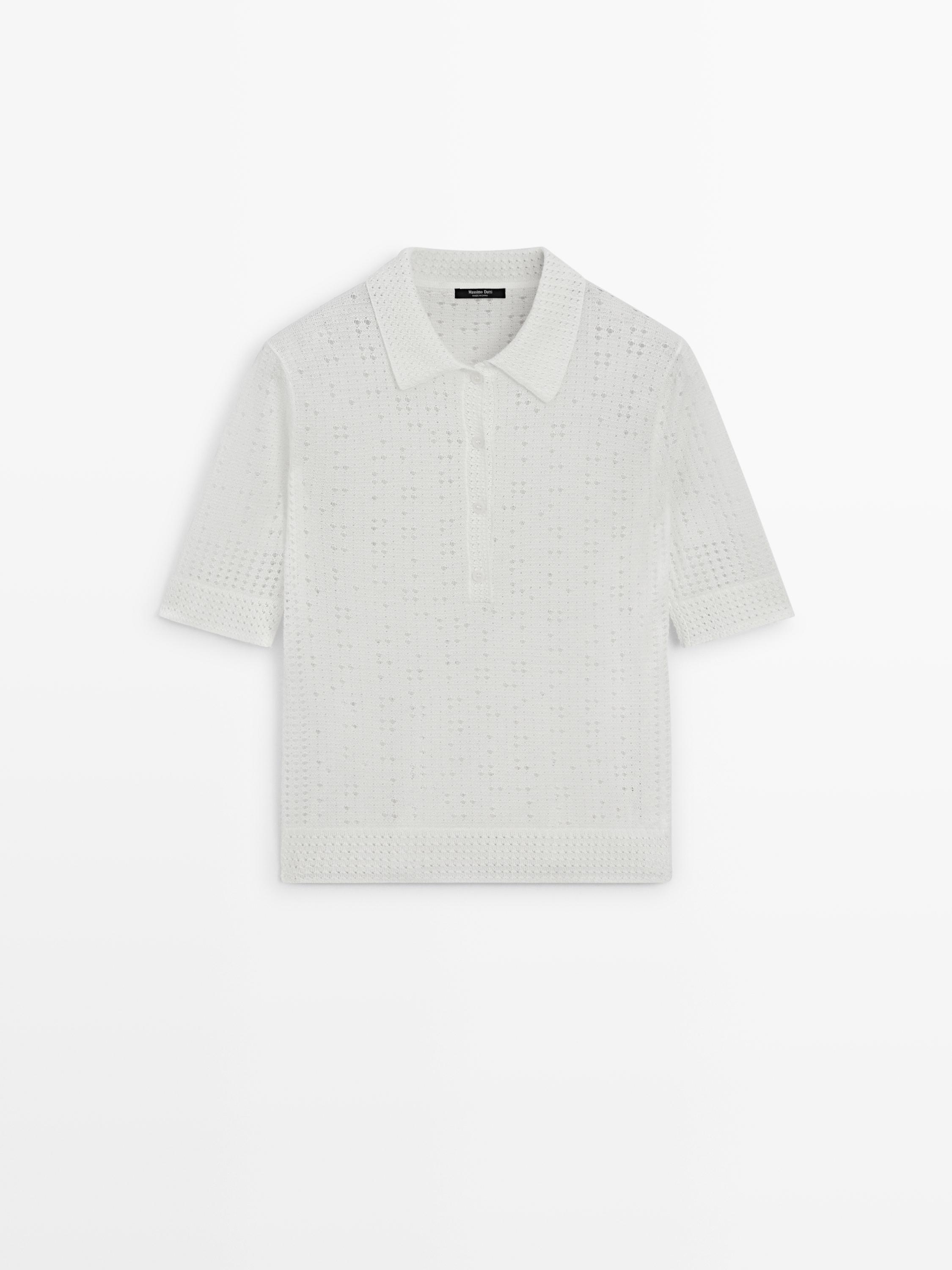 Front view of a raw knit polo-neck sweater with short sleeves and an openwork design.