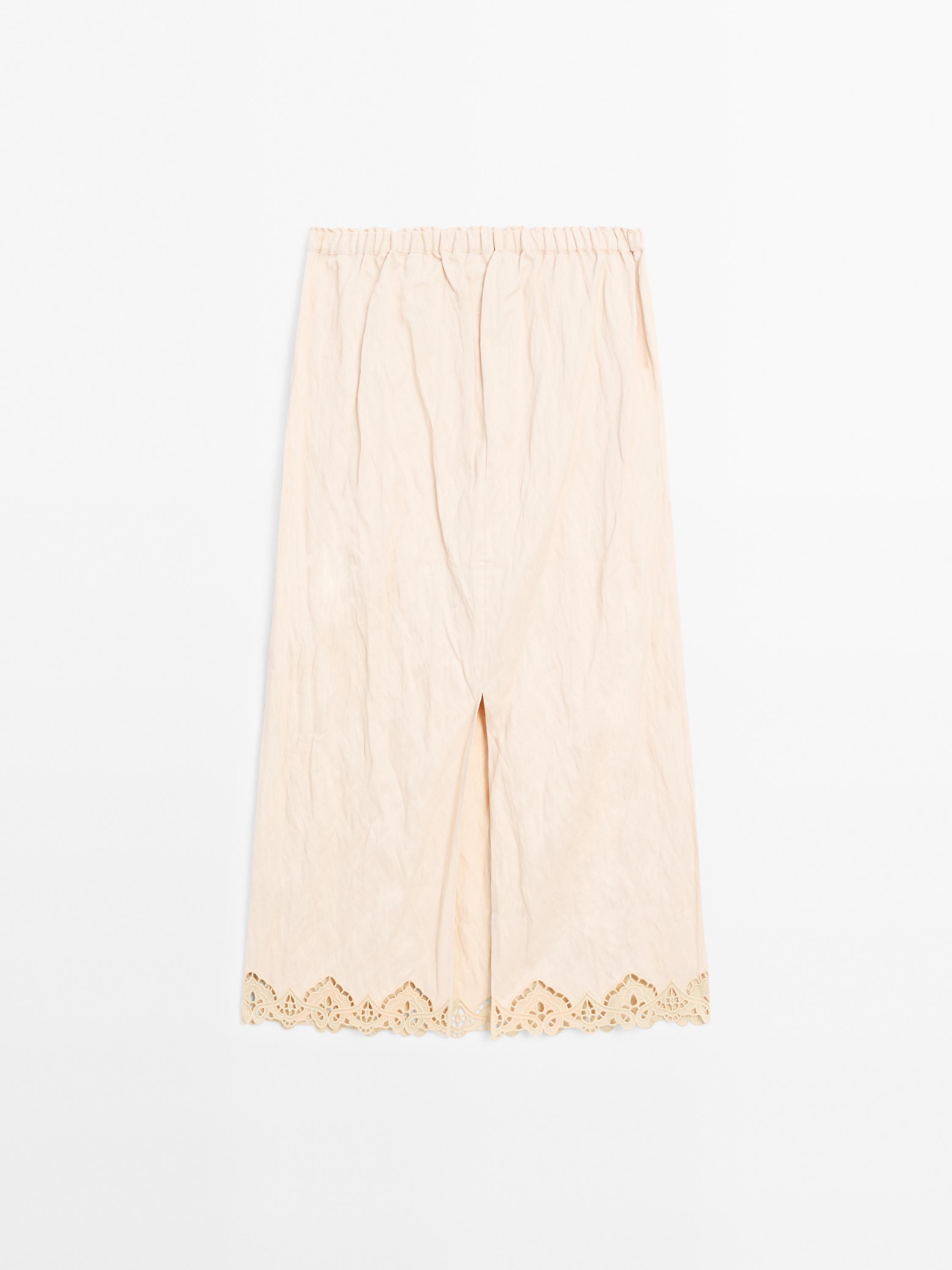 Flowing midi skirt with blonde lace detail