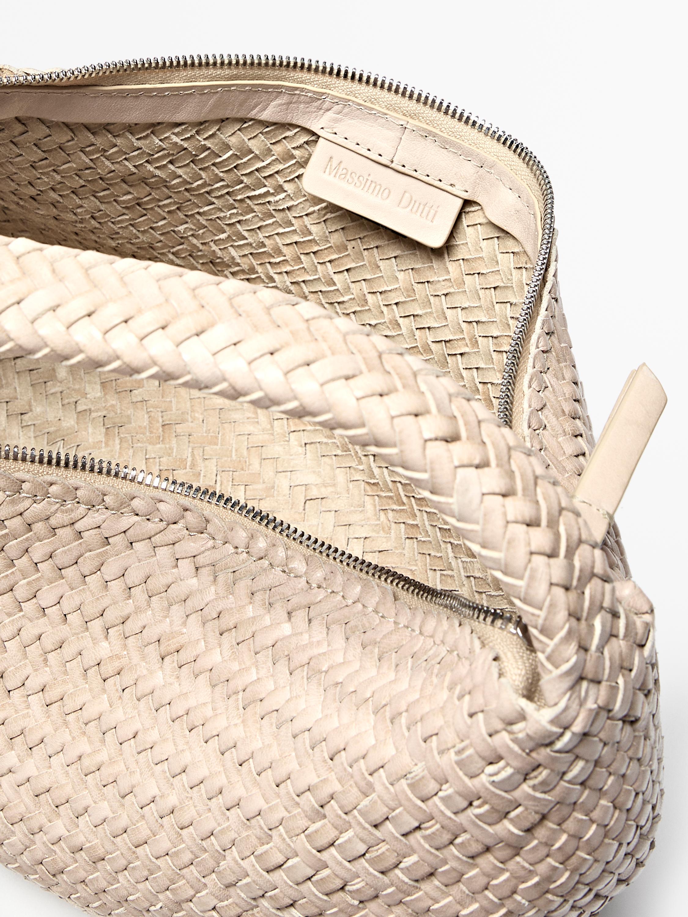 Braided leather half-moon bag — CREAM