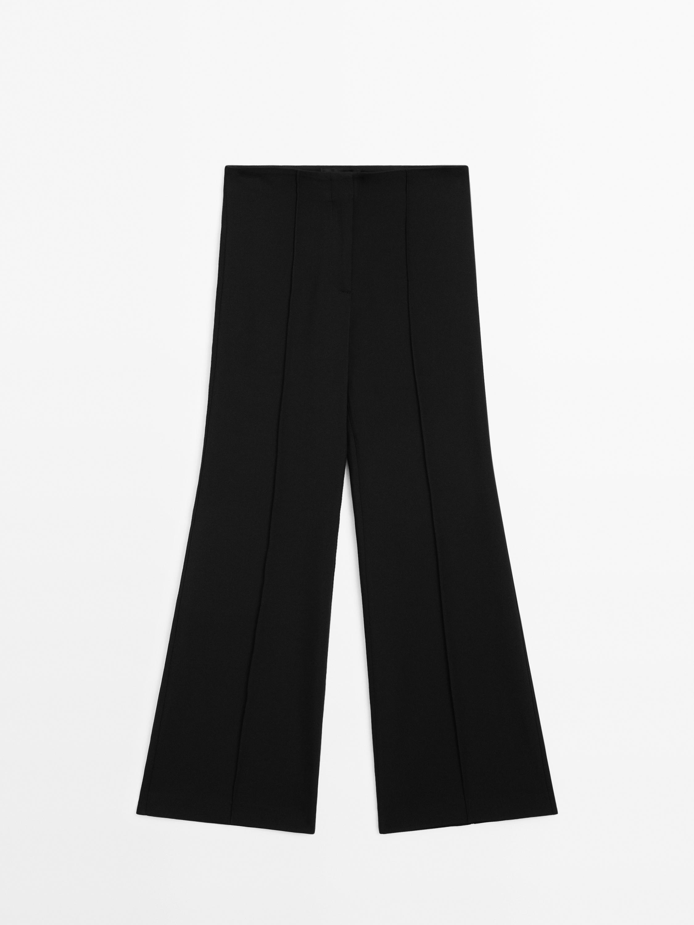 Calças flare fit com fecho de correr