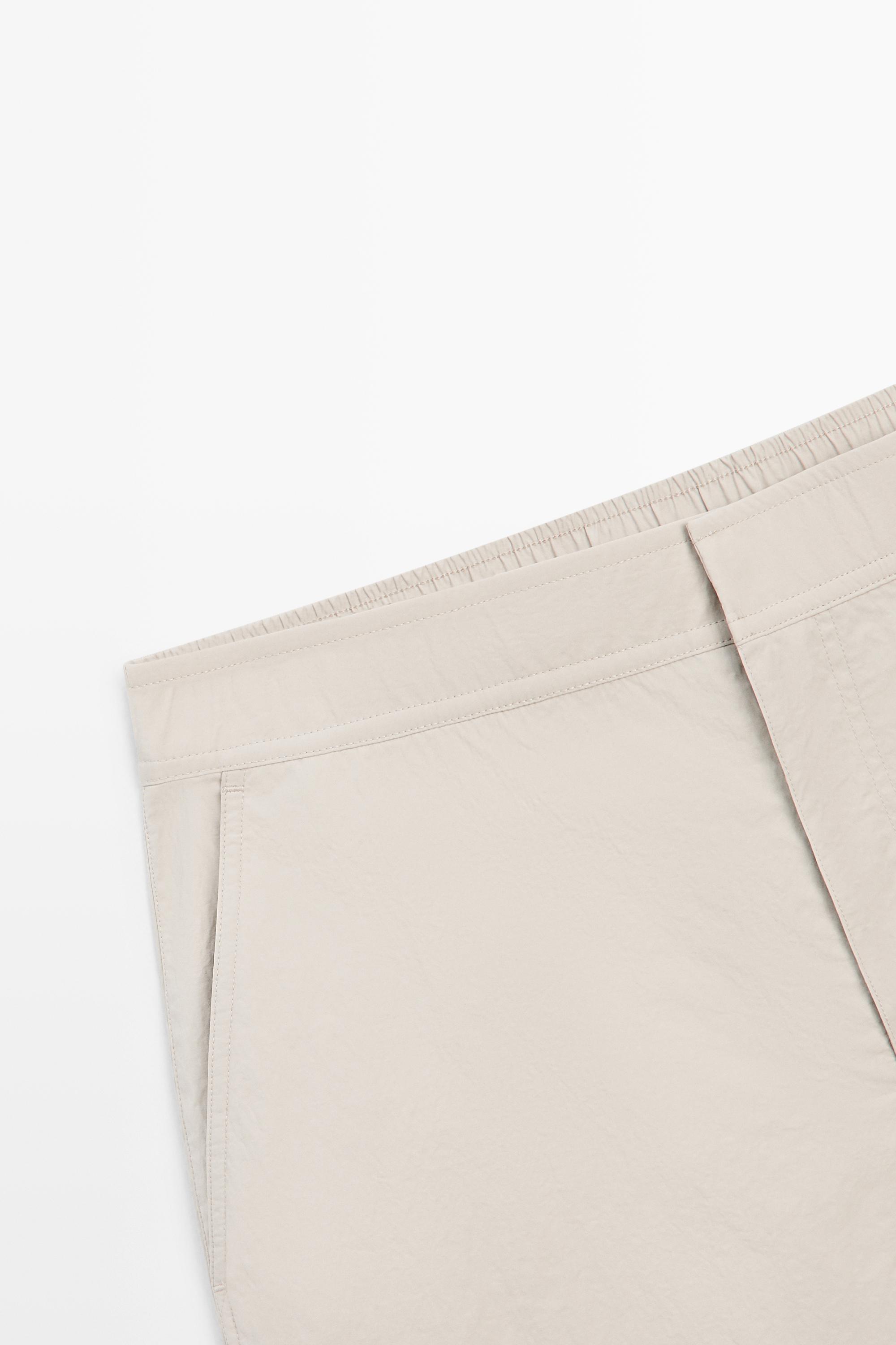Plain swimming trunks with waist detail — SAND