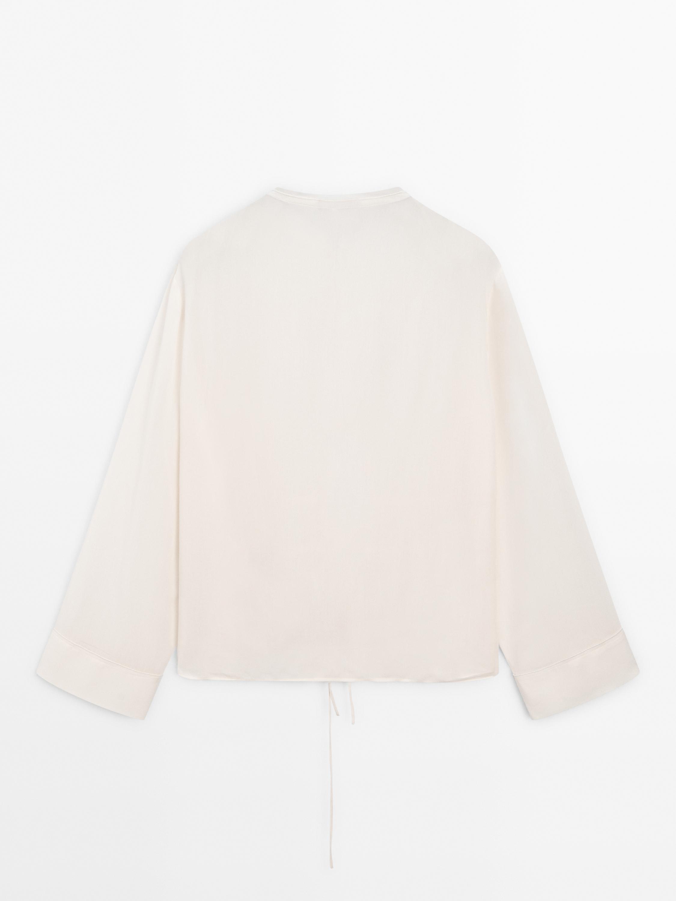 Flowing semi-sheer blouse with ties