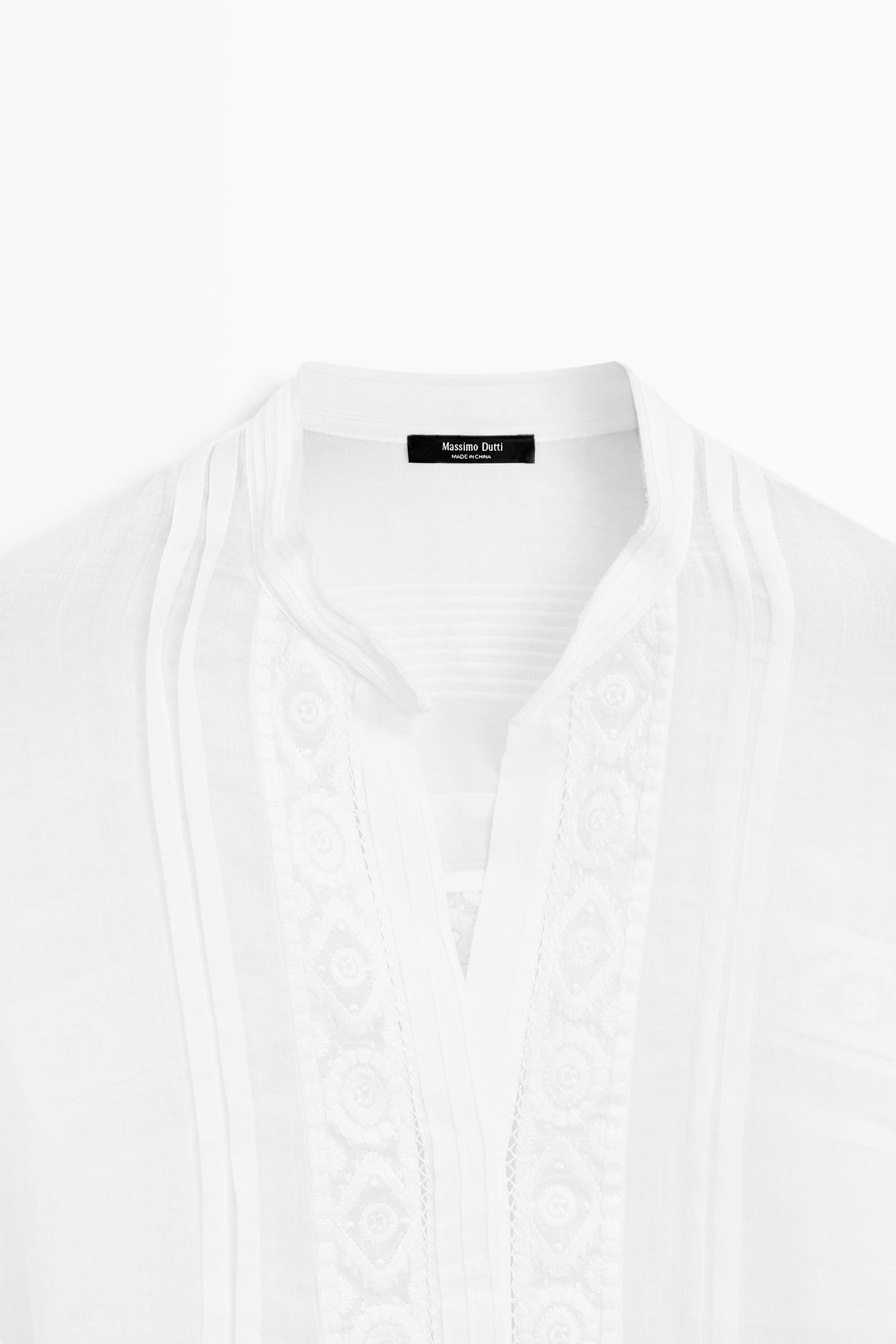 Stand collar blouse with embroidery and ruffles — WHITE