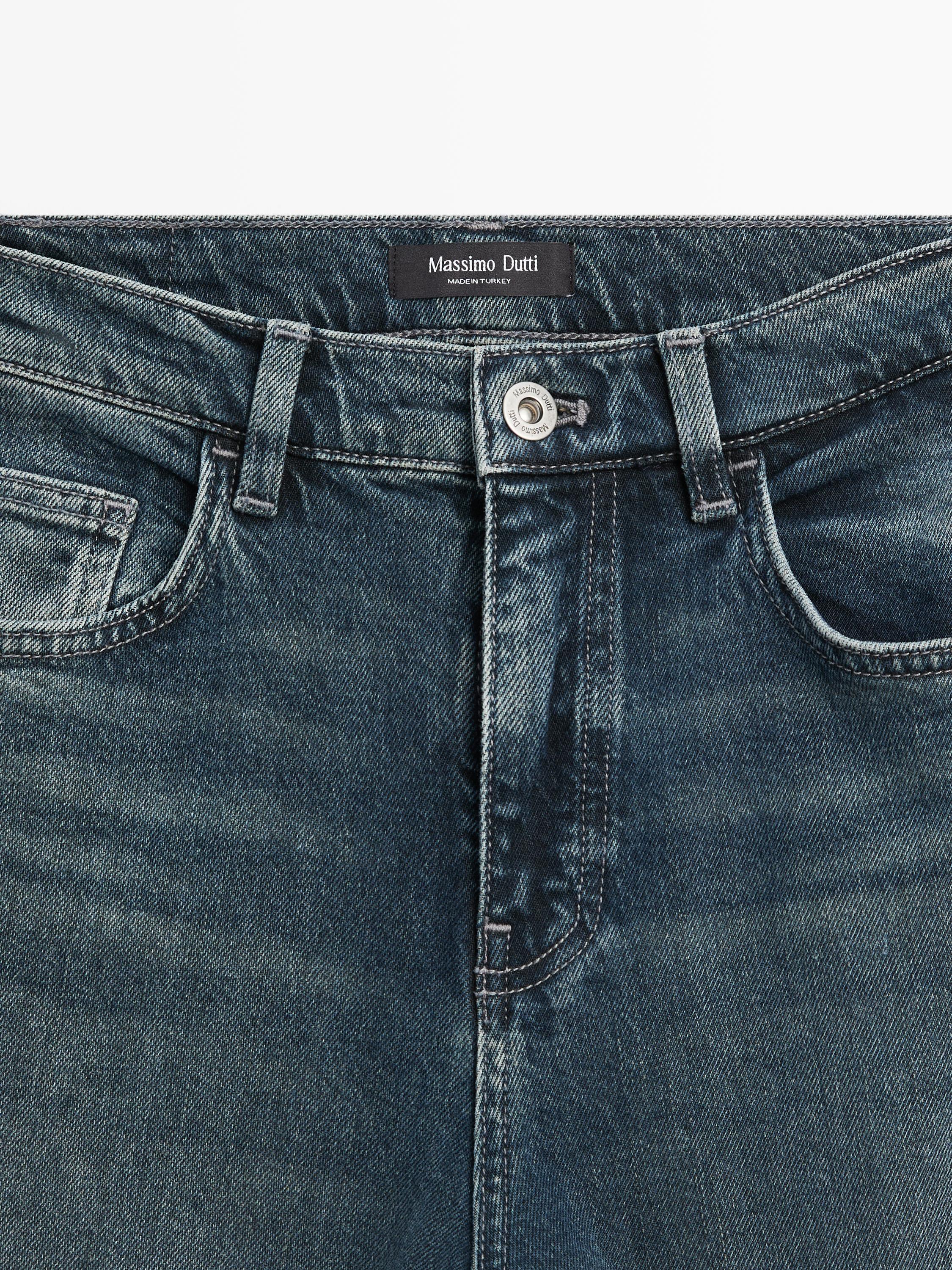 Jeans-Schlaghose mit halbhohem Bund