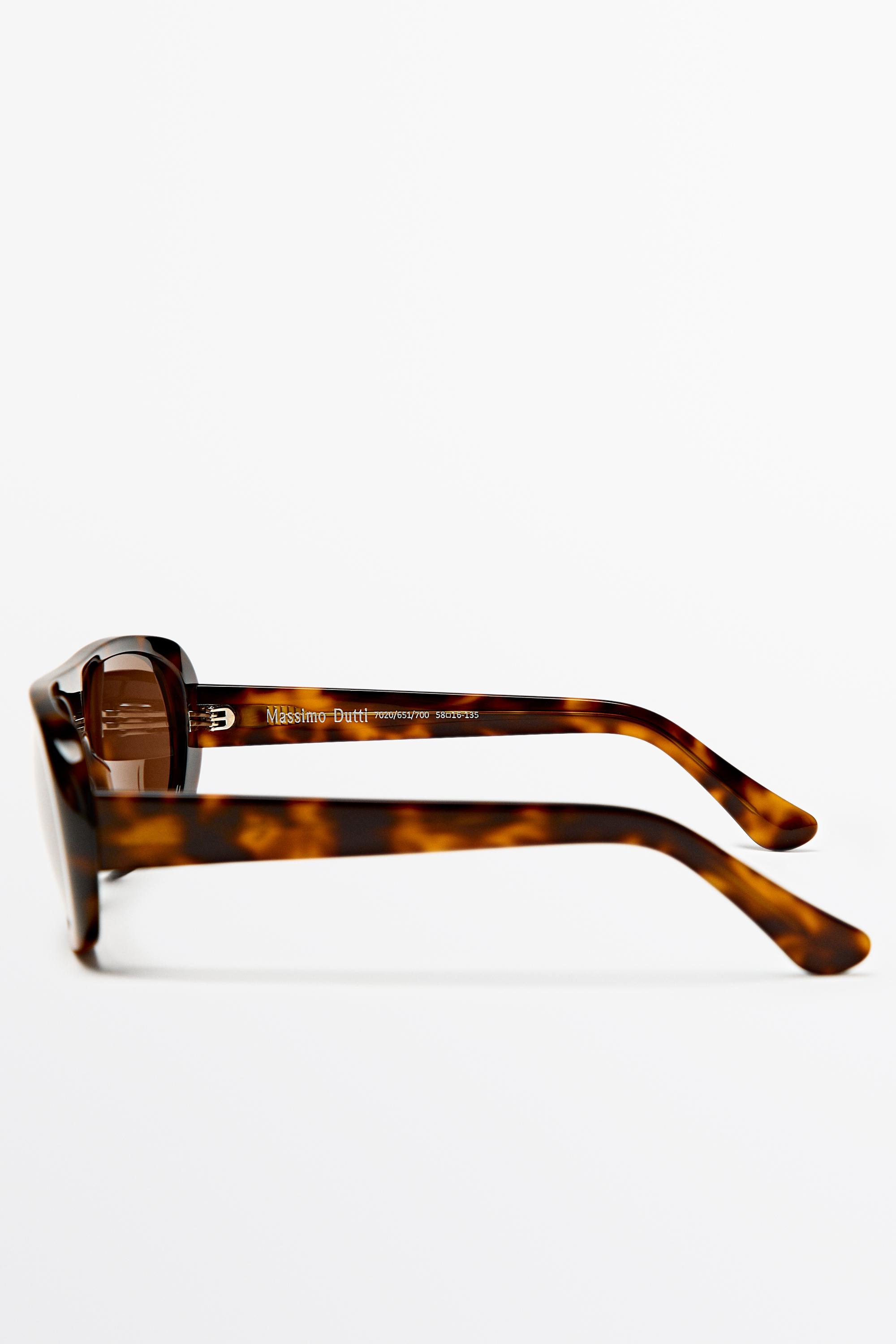 Oval tortoiseshell-effect sunglasses — BROWN
