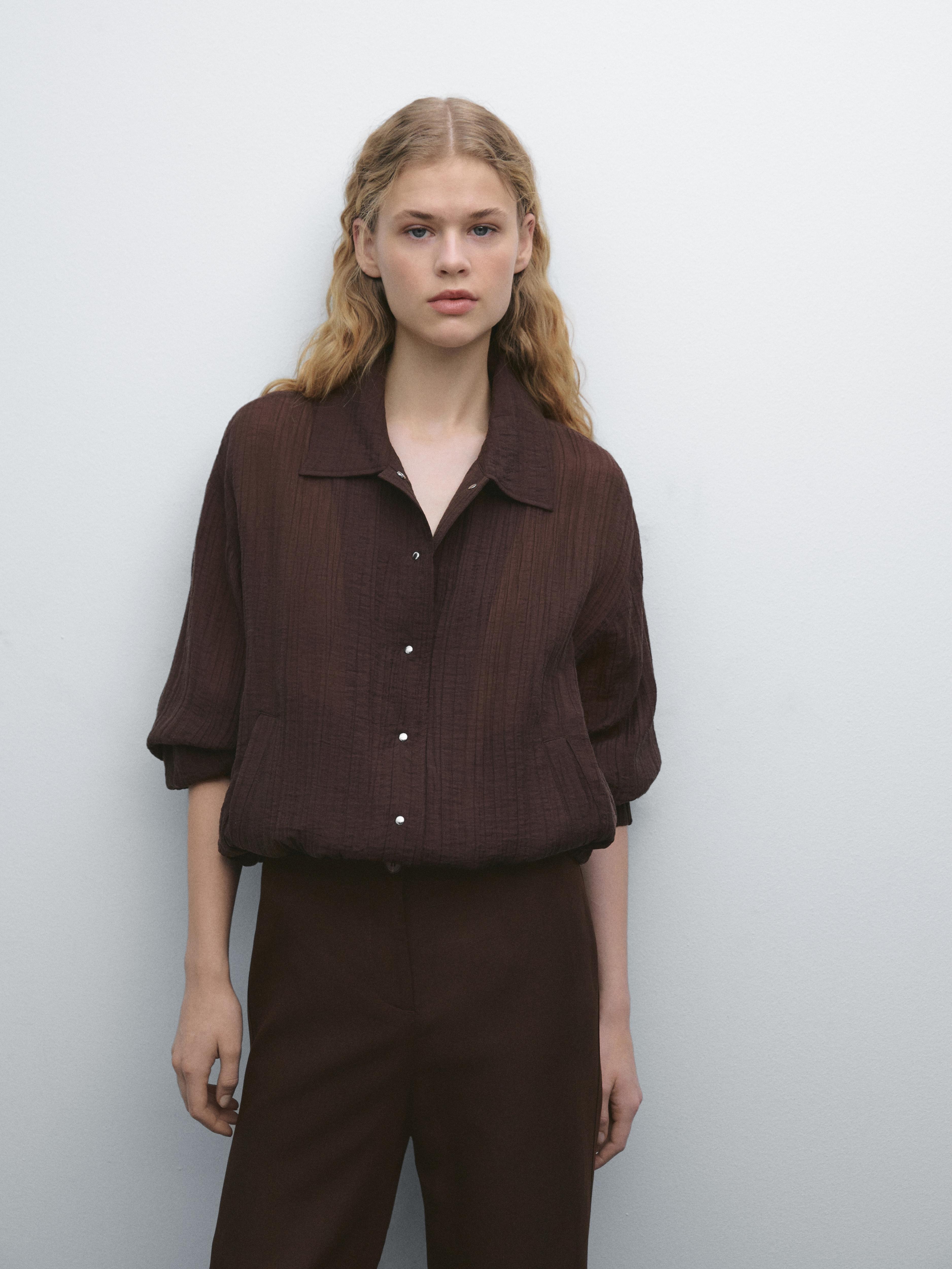 Flared trousers with seams