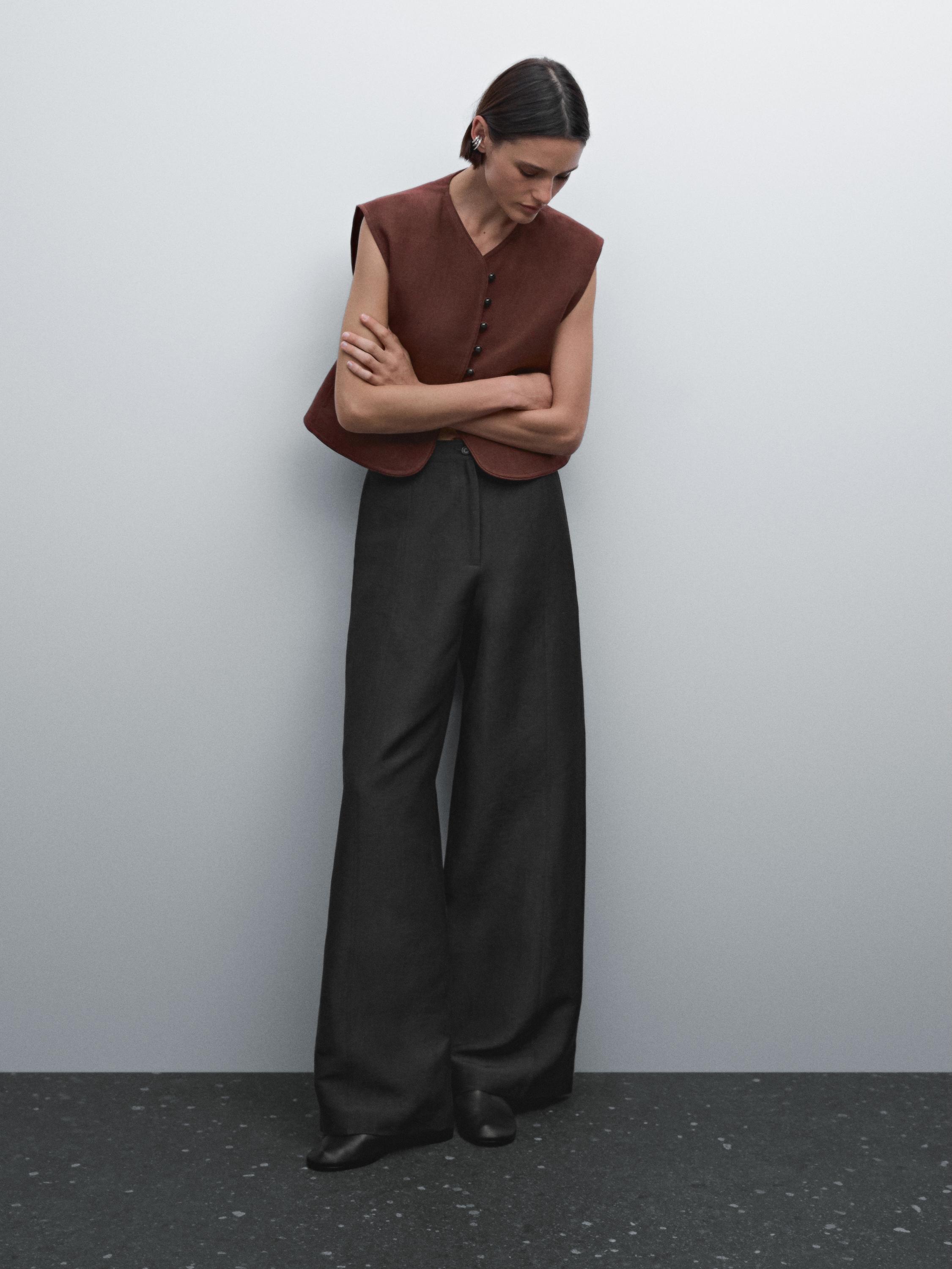 Flowing wide-leg trousers with seam details
