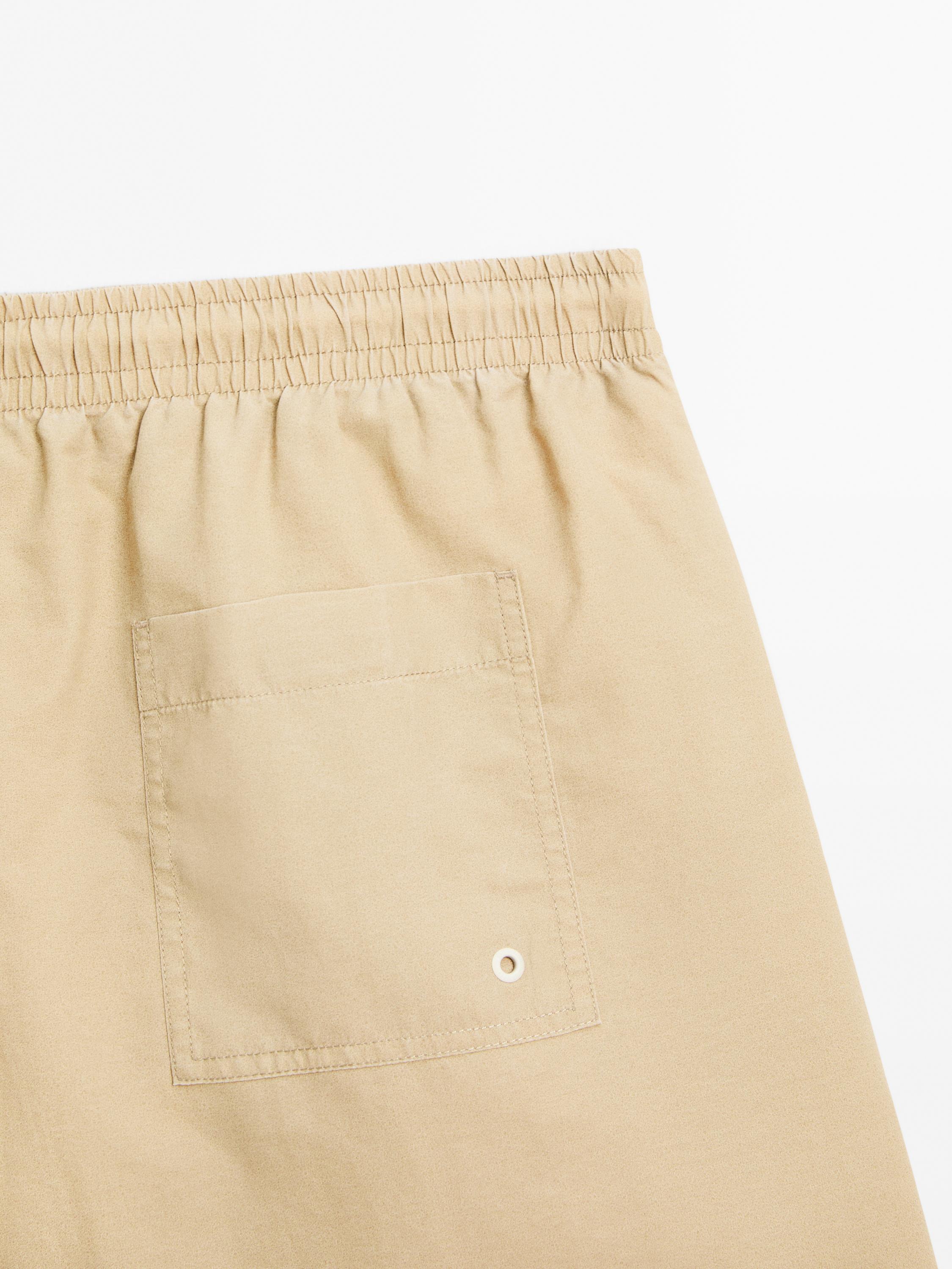 Plain regular fit swimming trunks