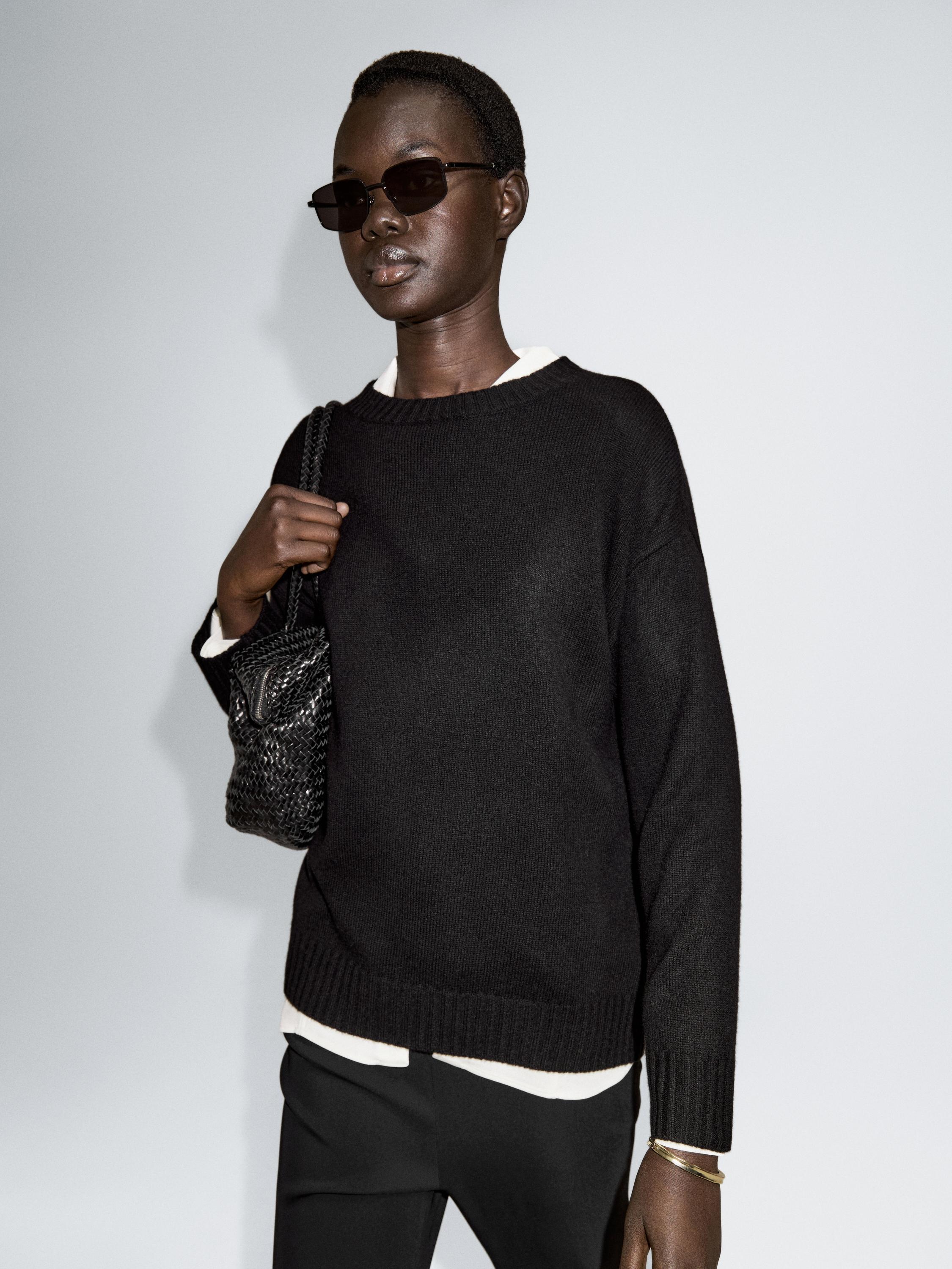 Flared trousers with pocket — BLACK
