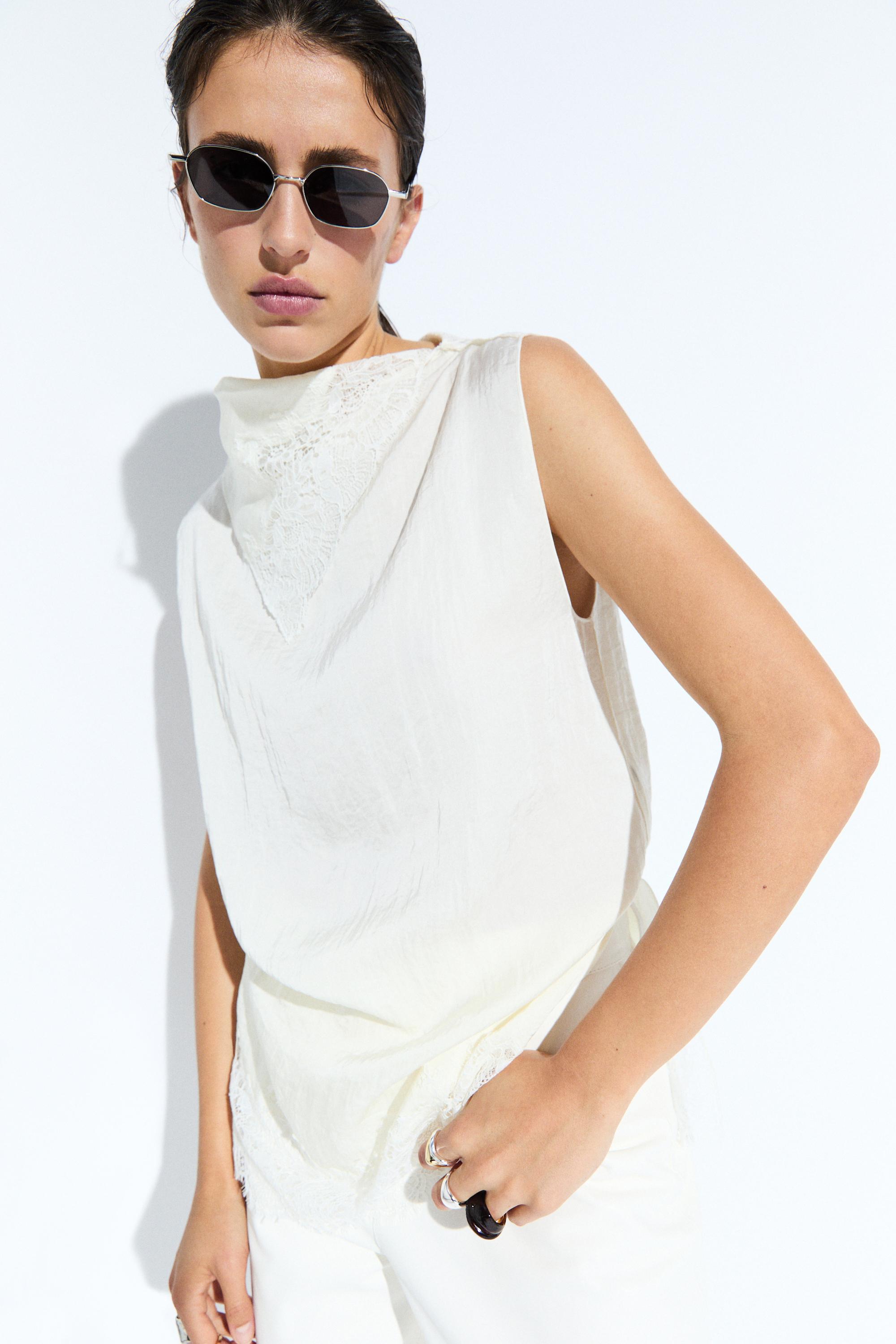 Asymmetric roll neck top with lace detail — CREAM