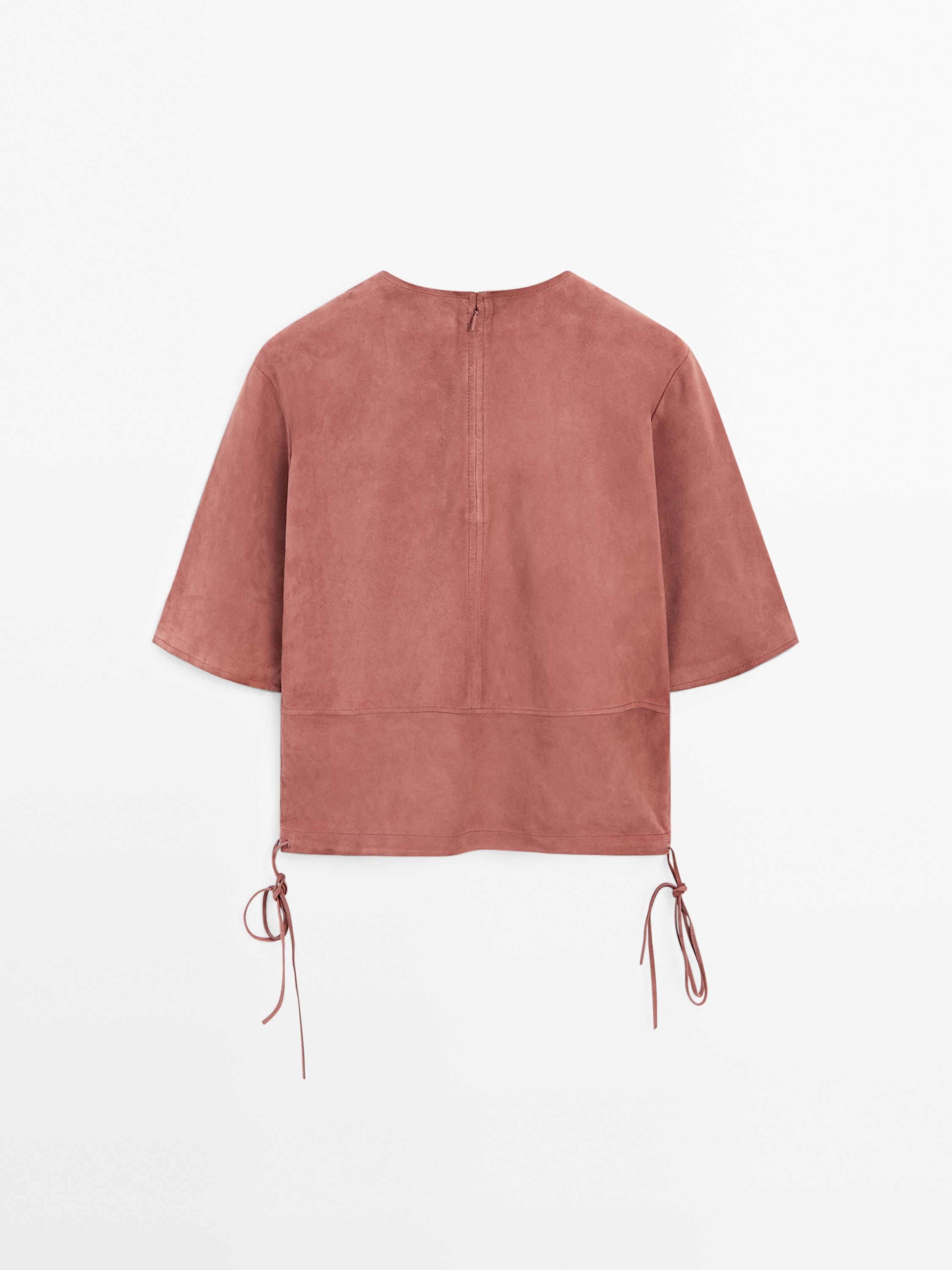 Suede leather top with strap detail