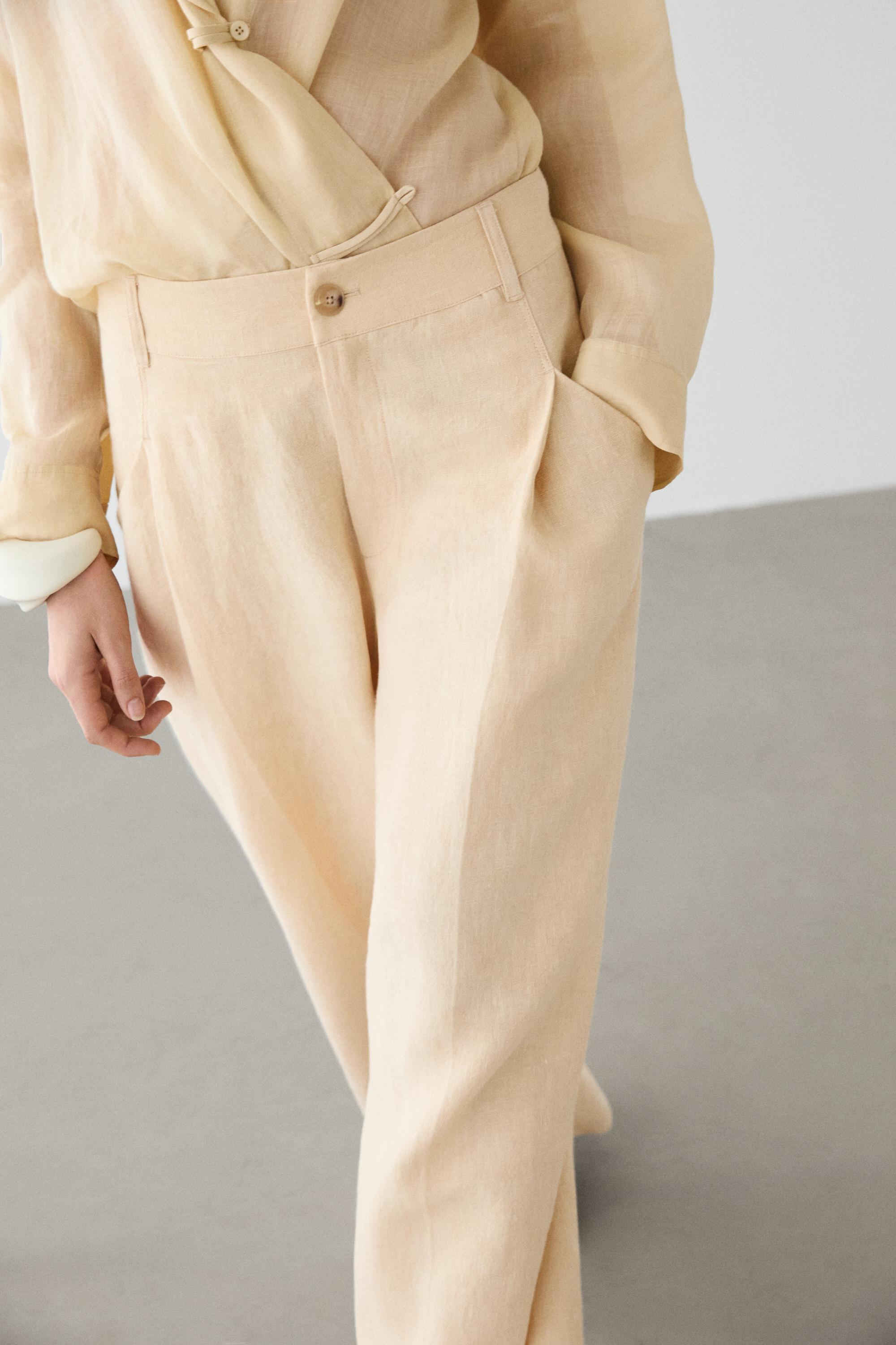 Wide-leg linen trousers with pocket detail — SAND