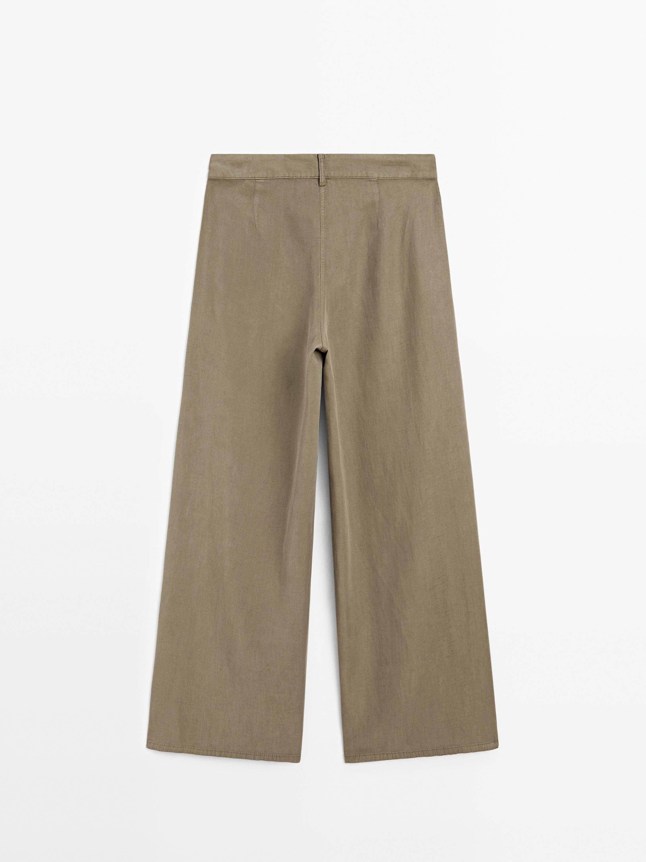 Flowing barrel fit trousers with seam detail