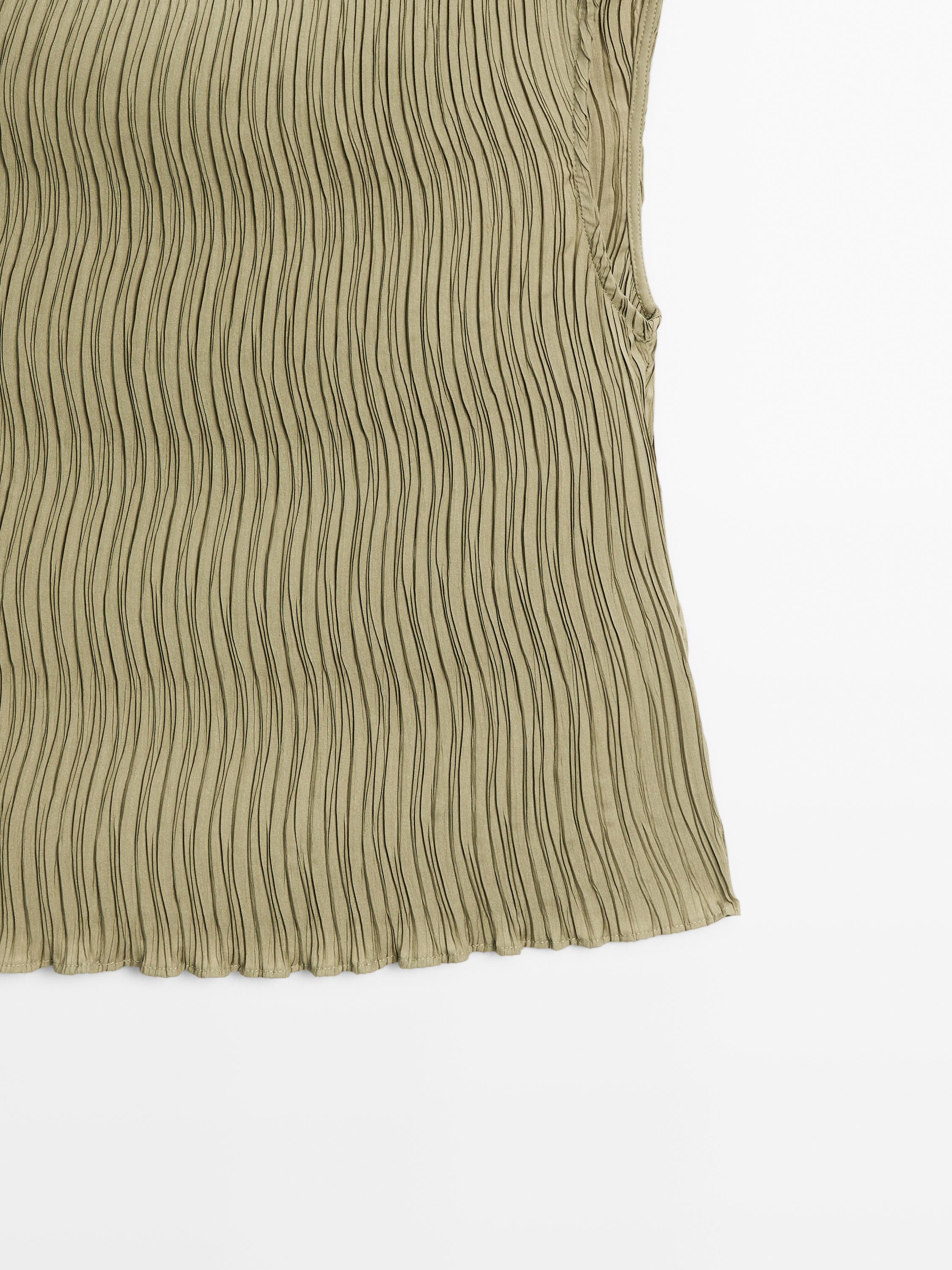 Creased-effect pleated top