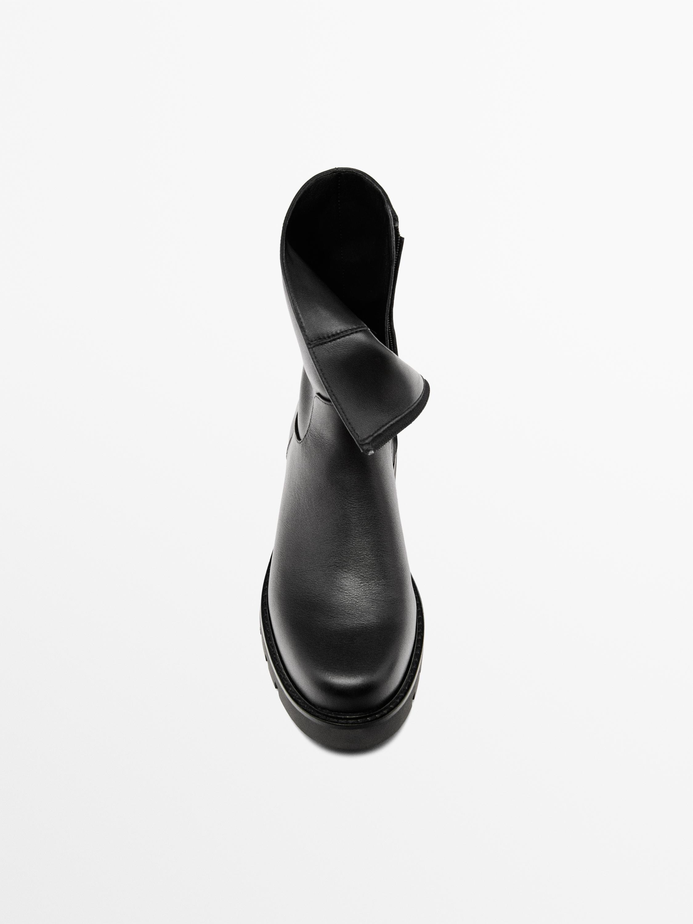 Track sole flat ankle boots