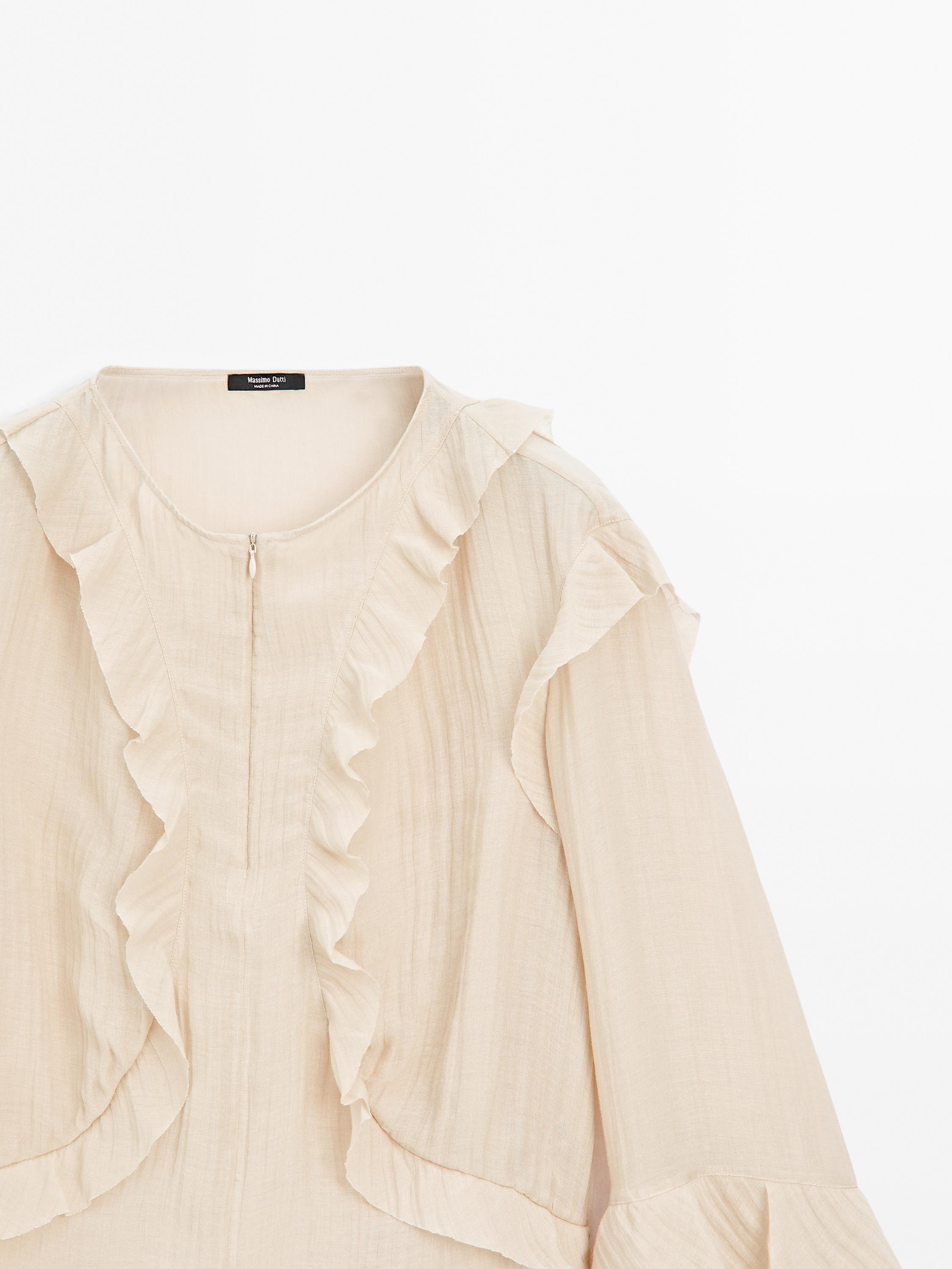 Flowing blouse with ruffles