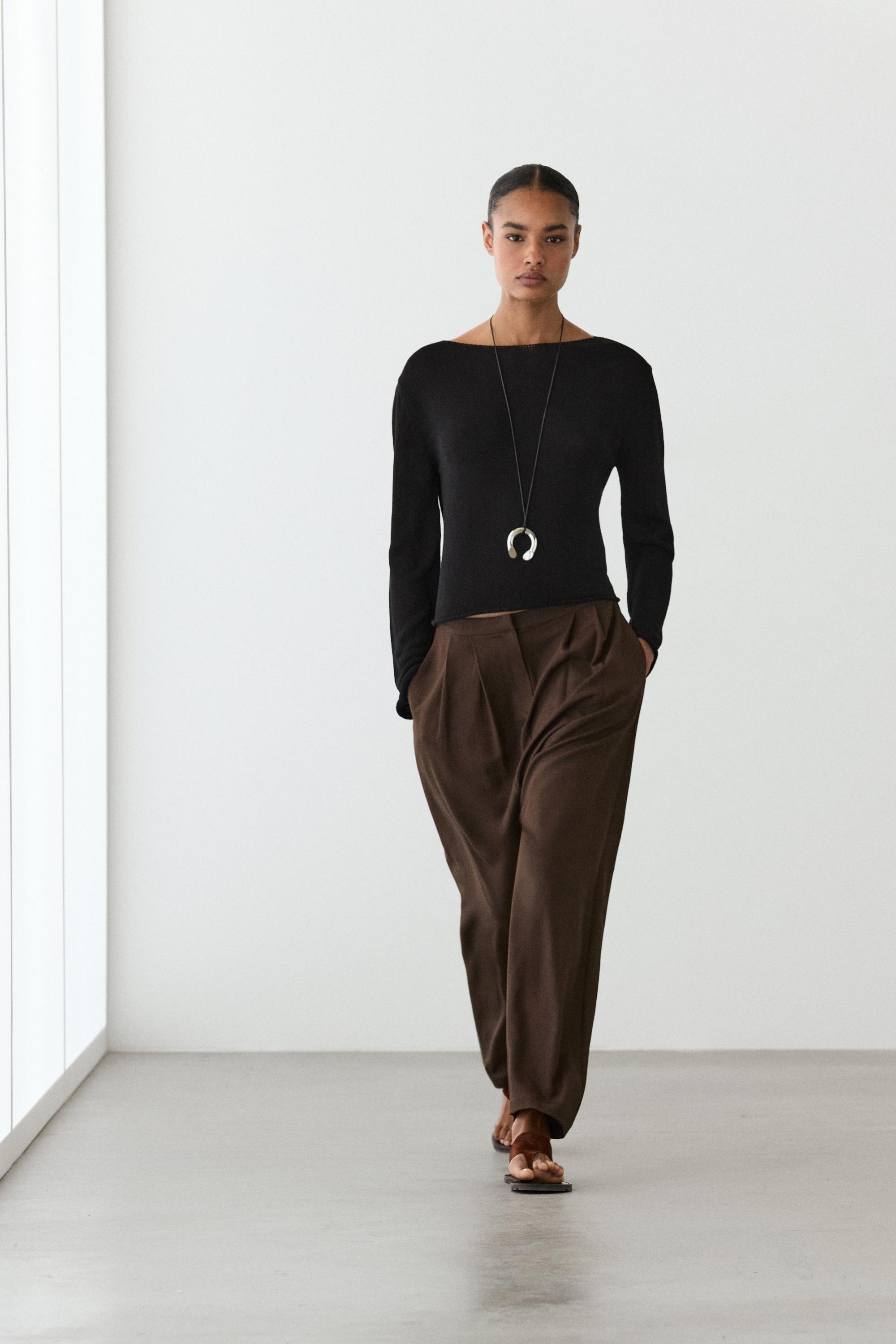 Flowing knit boat neck sweater