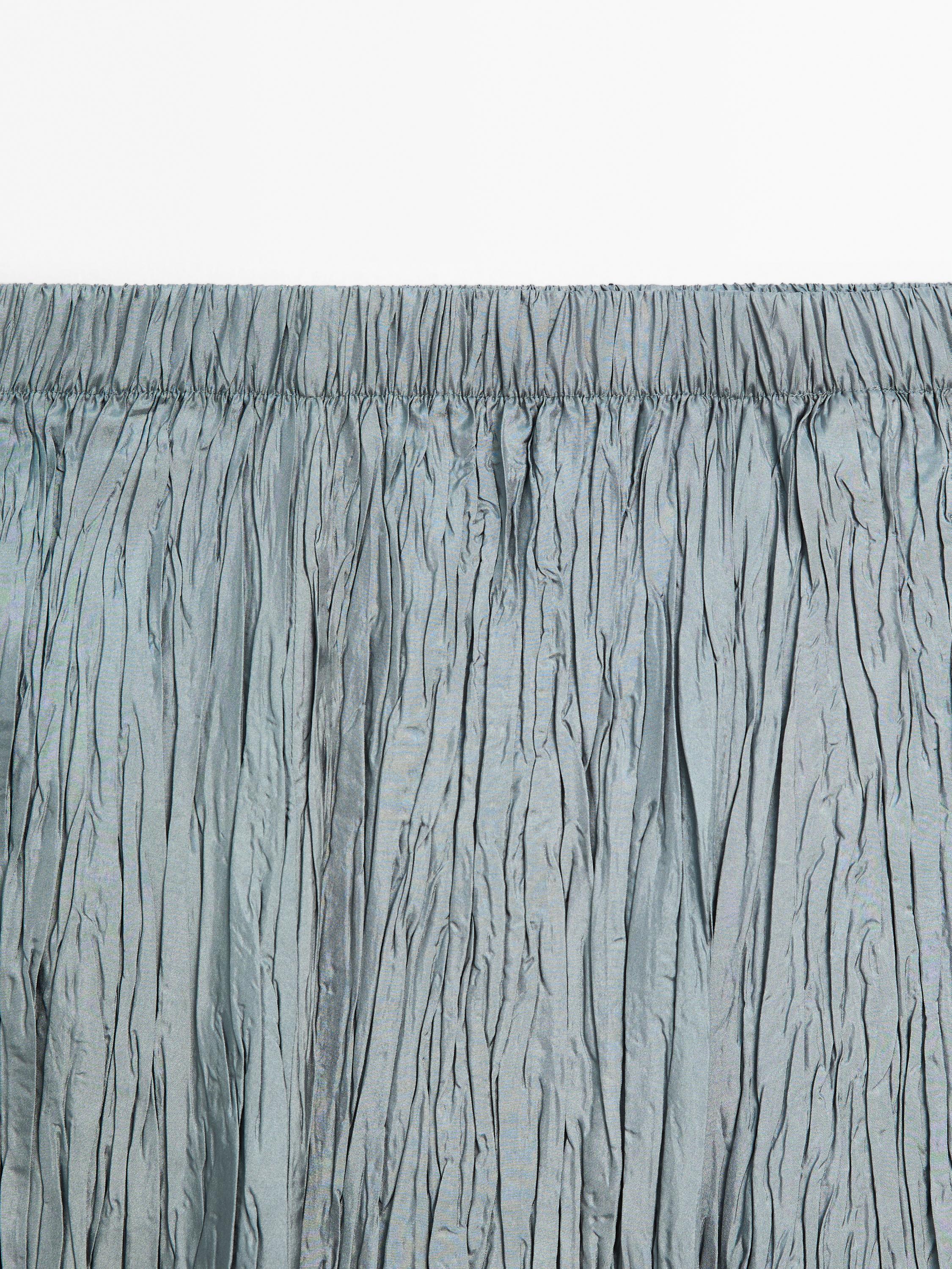 Long pleated skirt with elasticated waistband