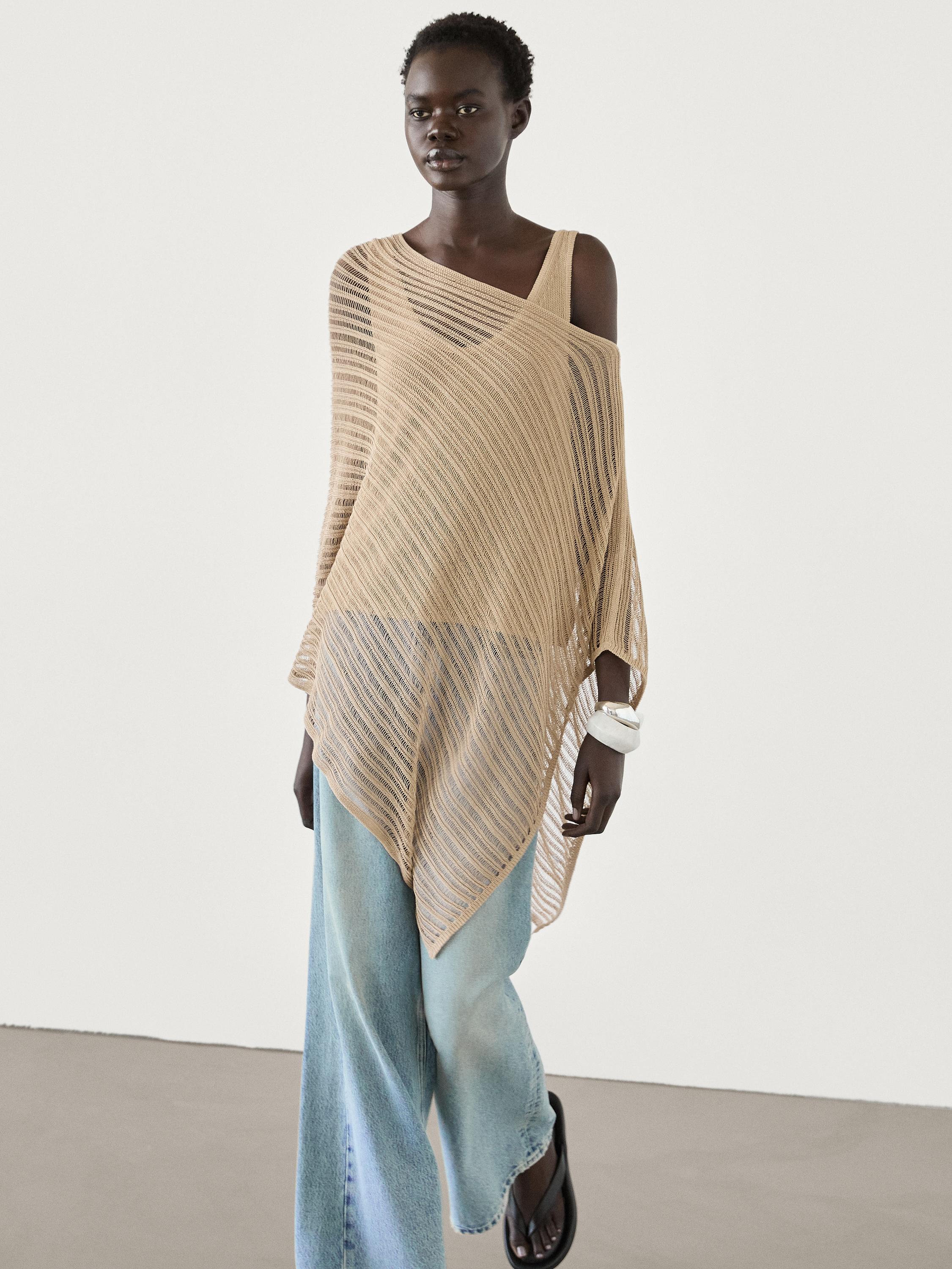 Haut cape asymétrique en maille semi-transparent