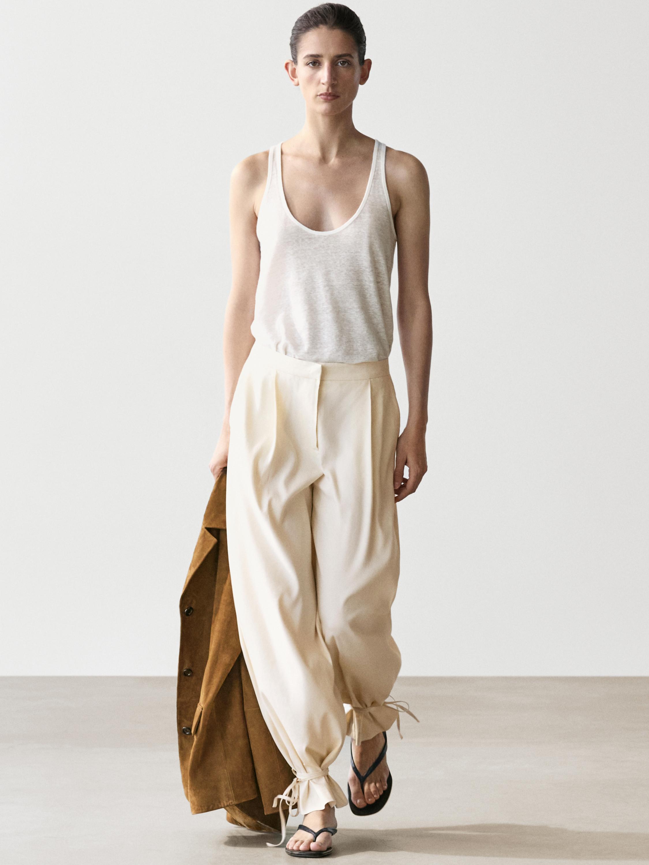 Flowing barrel fit trousers — CREAM