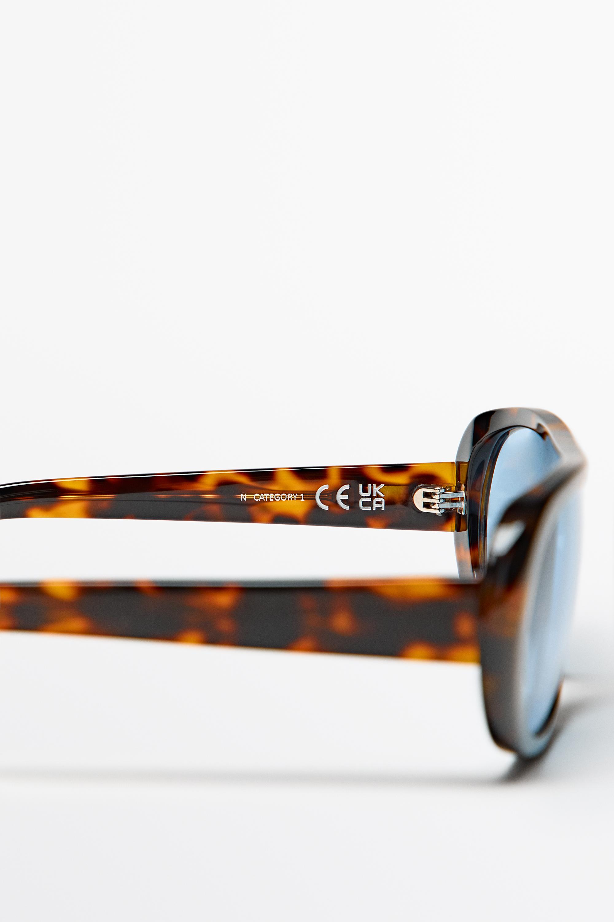Wide tortoiseshell-effect sunglasses — BLUE