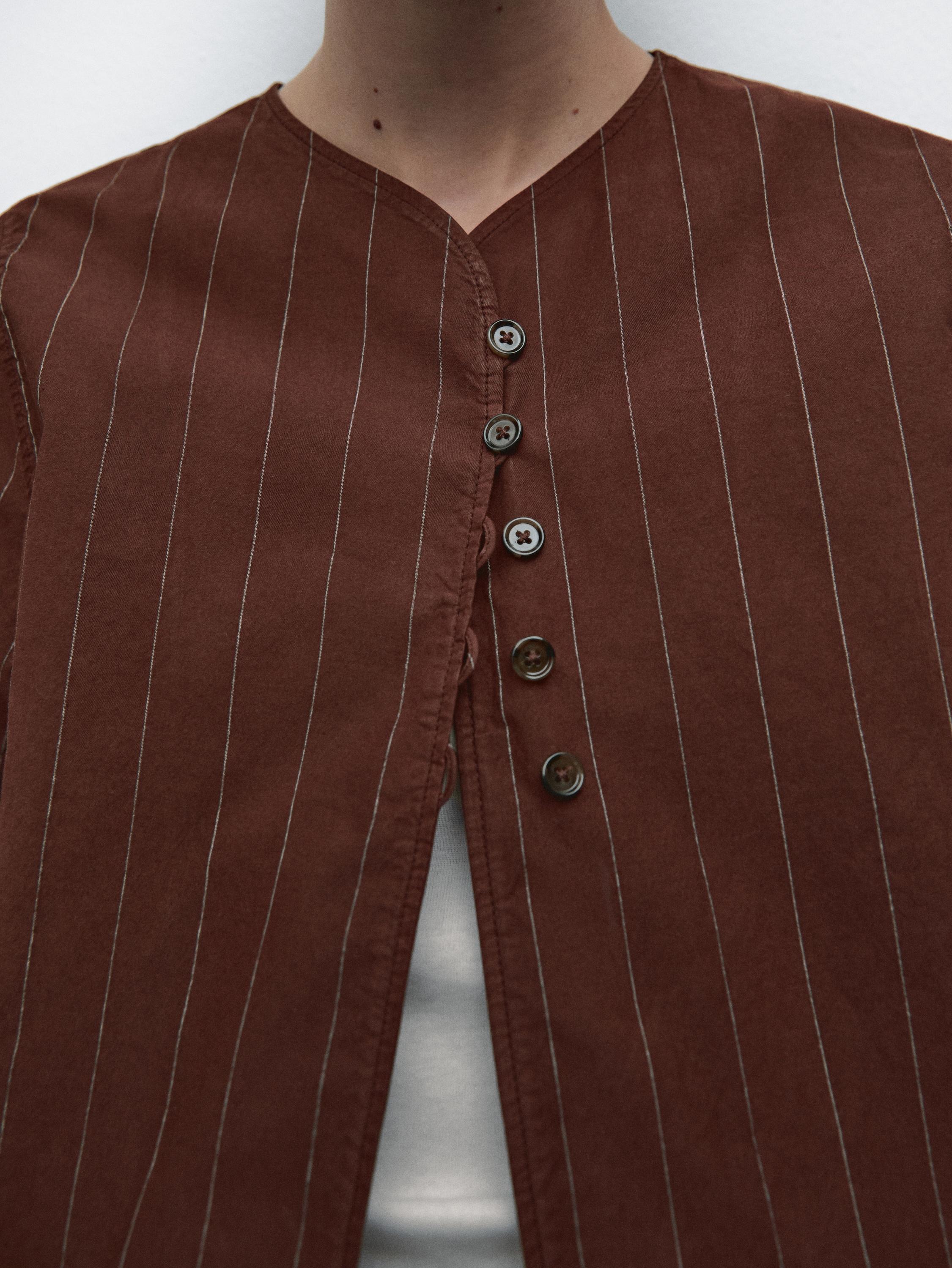 Striped jacket with button detail