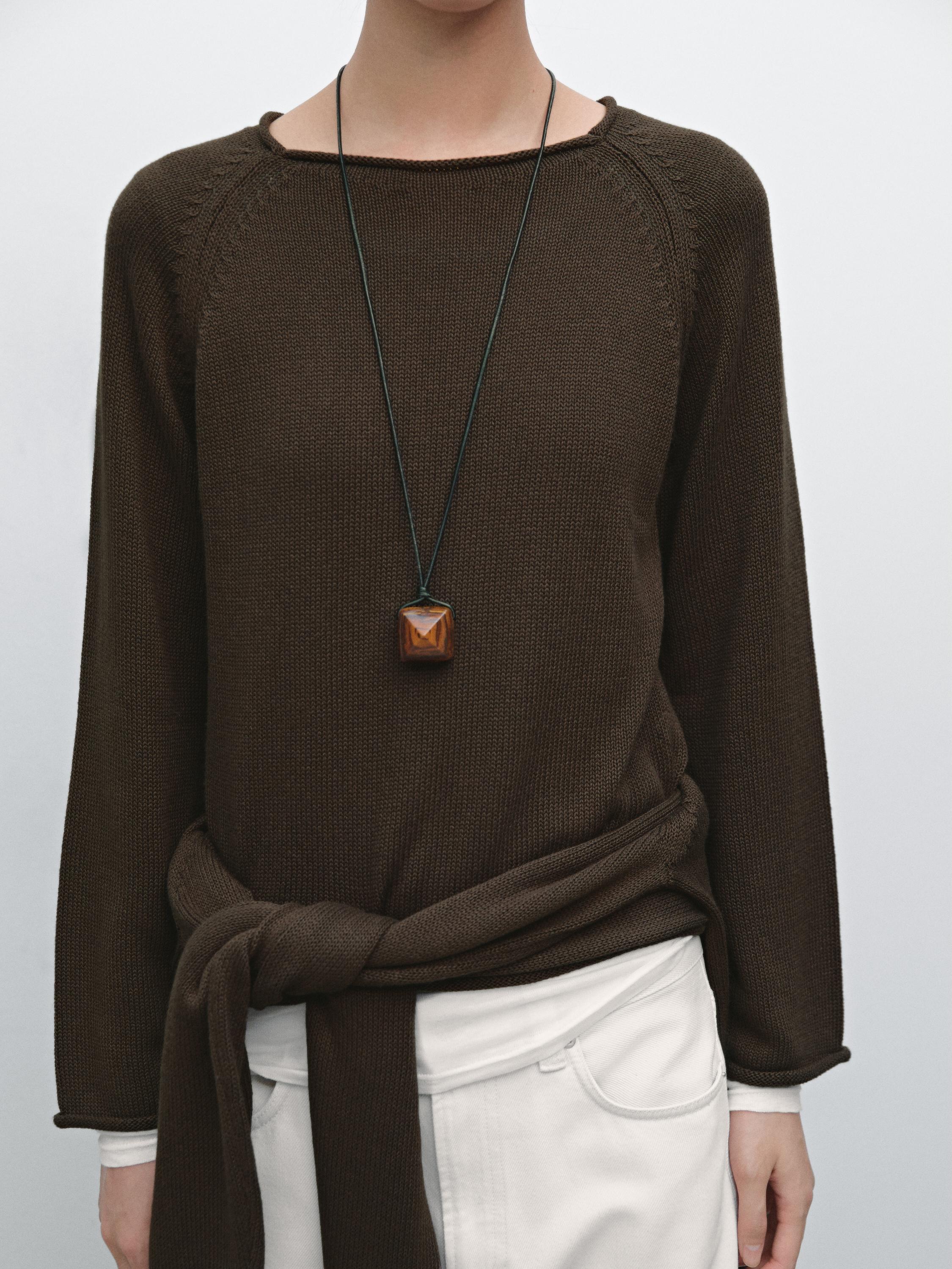 Purl knit cutwork sweater