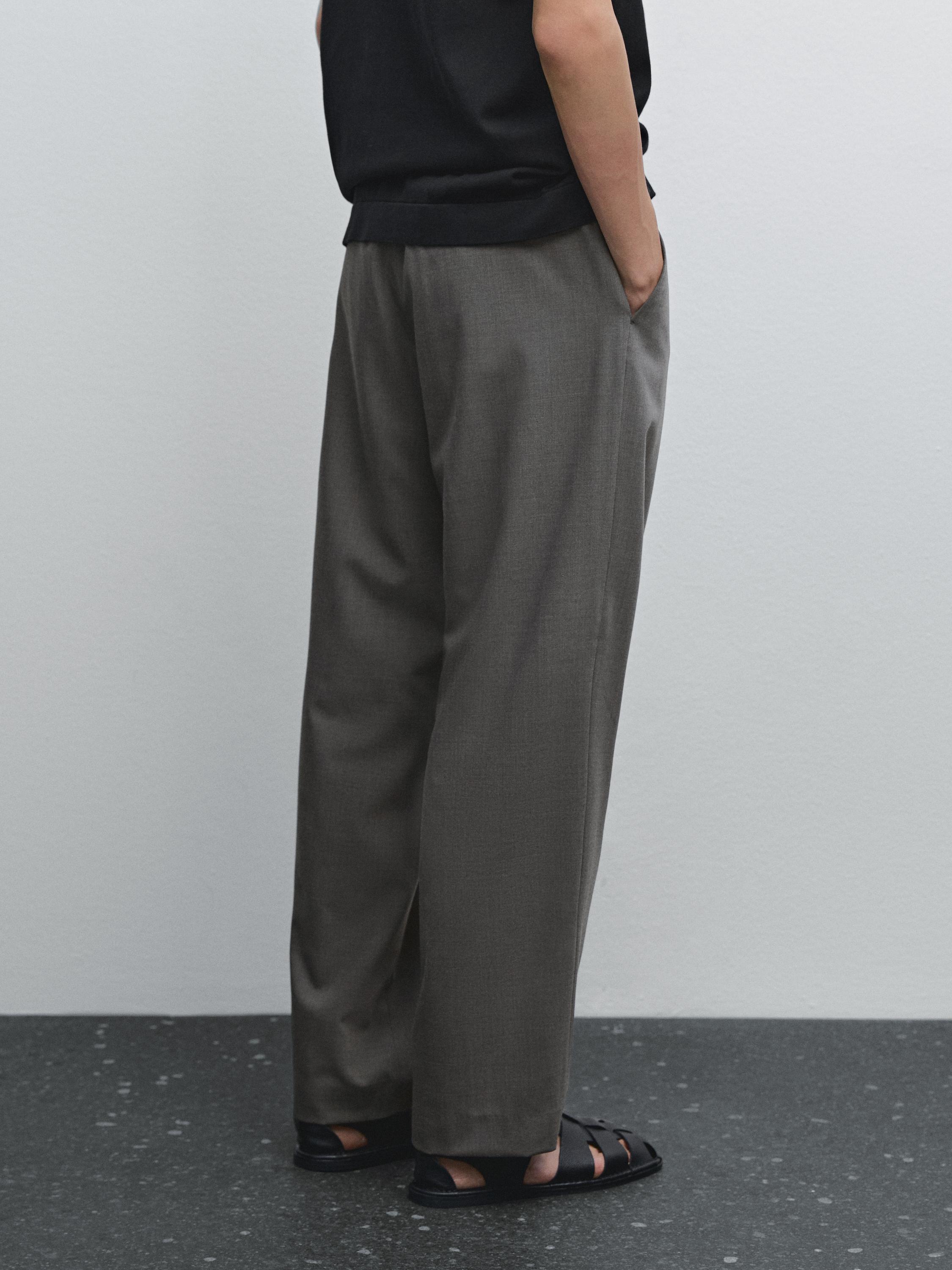 休閒版打褶長褲