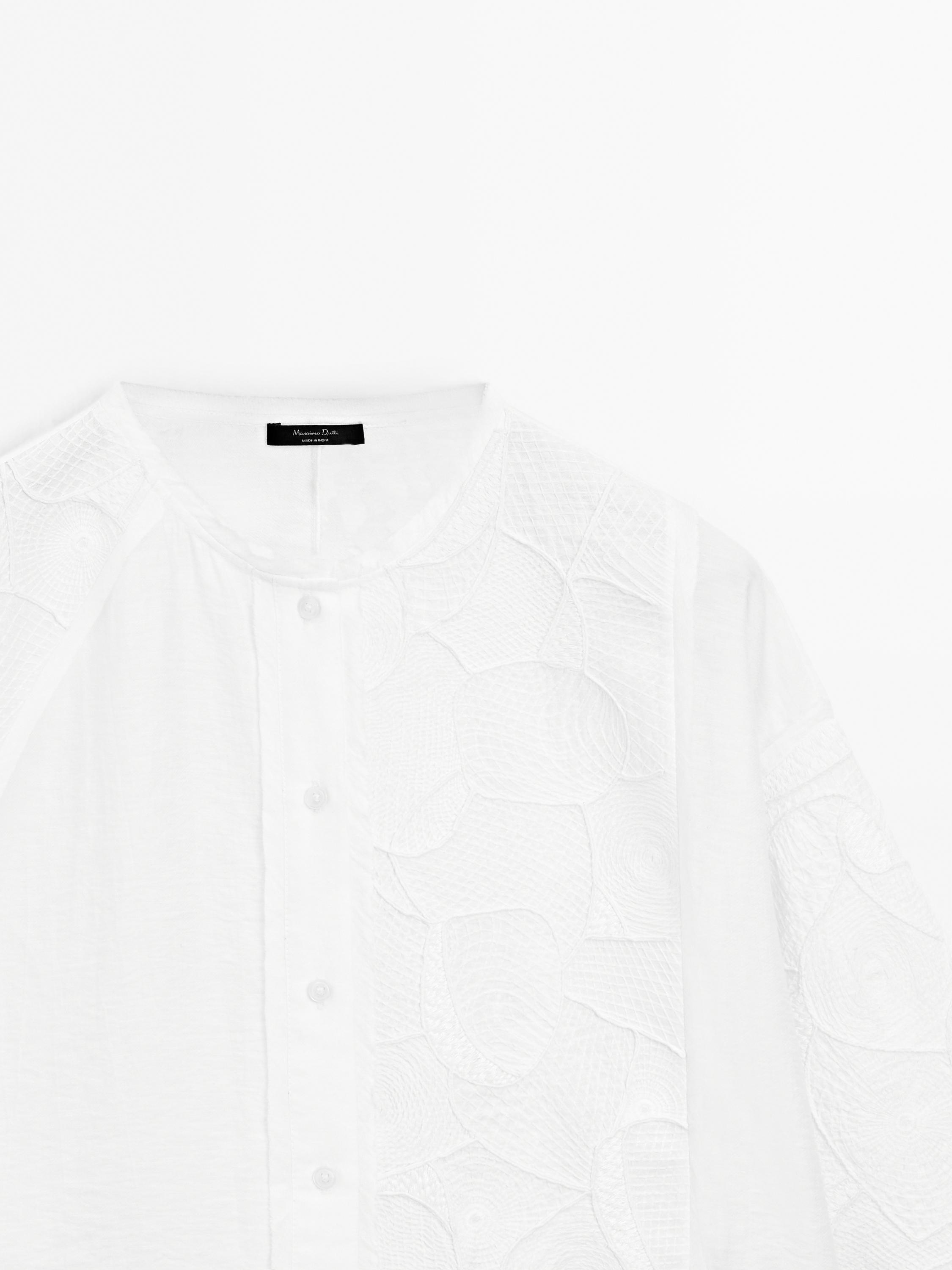 Flowing shirt with embroidered detail