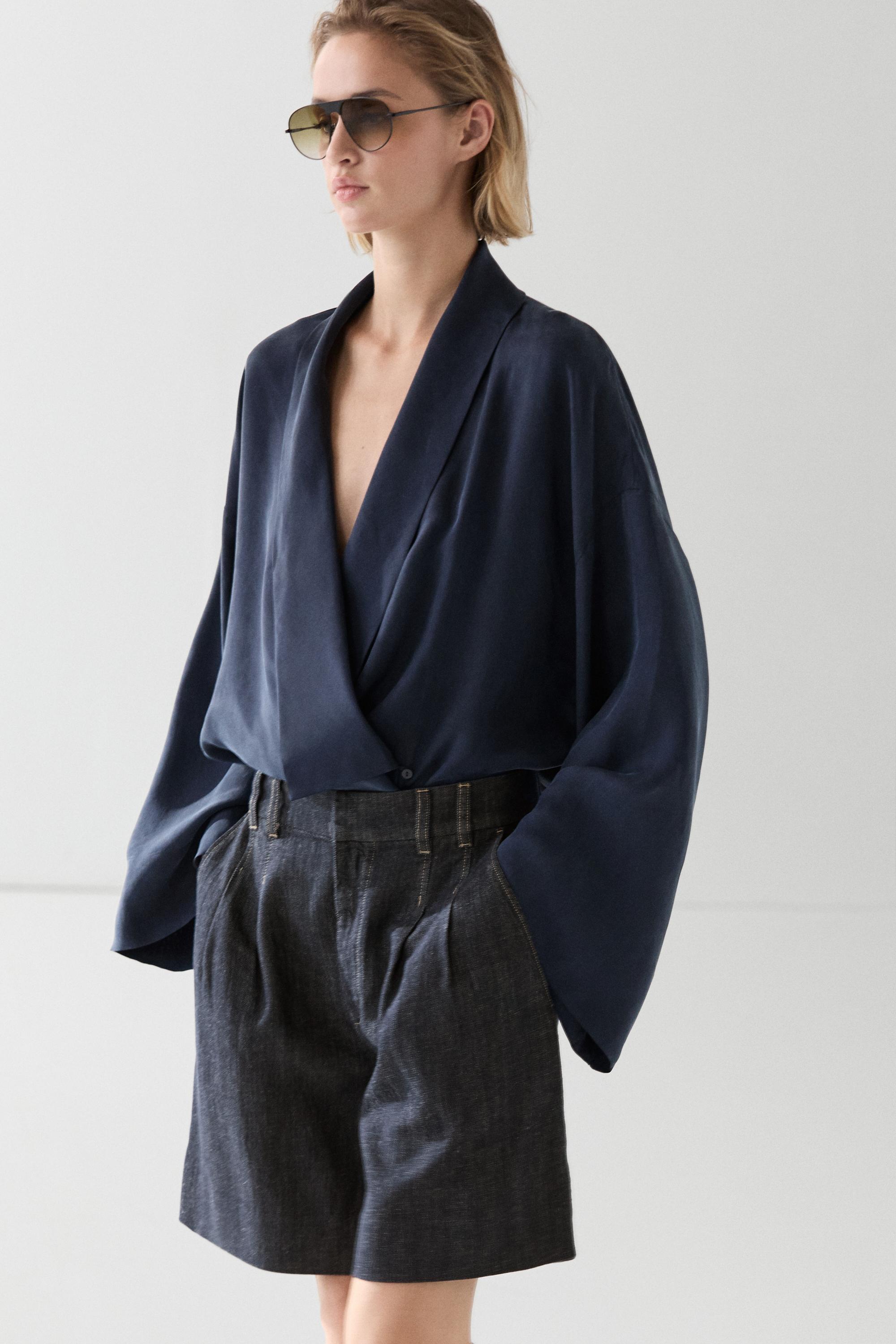Cotton denim Bermuda shorts with topstitching — DARK BLUE