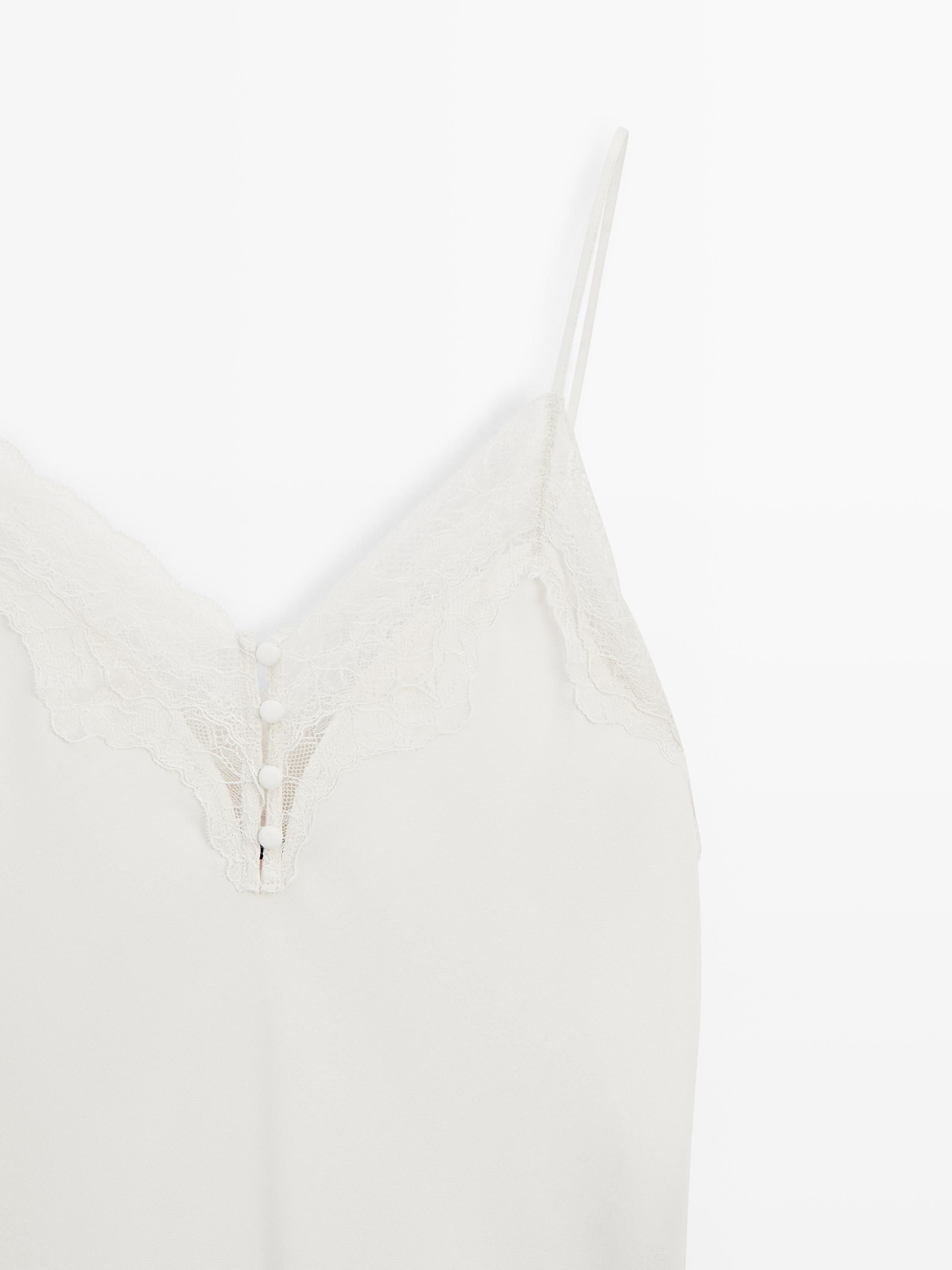 Čipkast top z gumbi