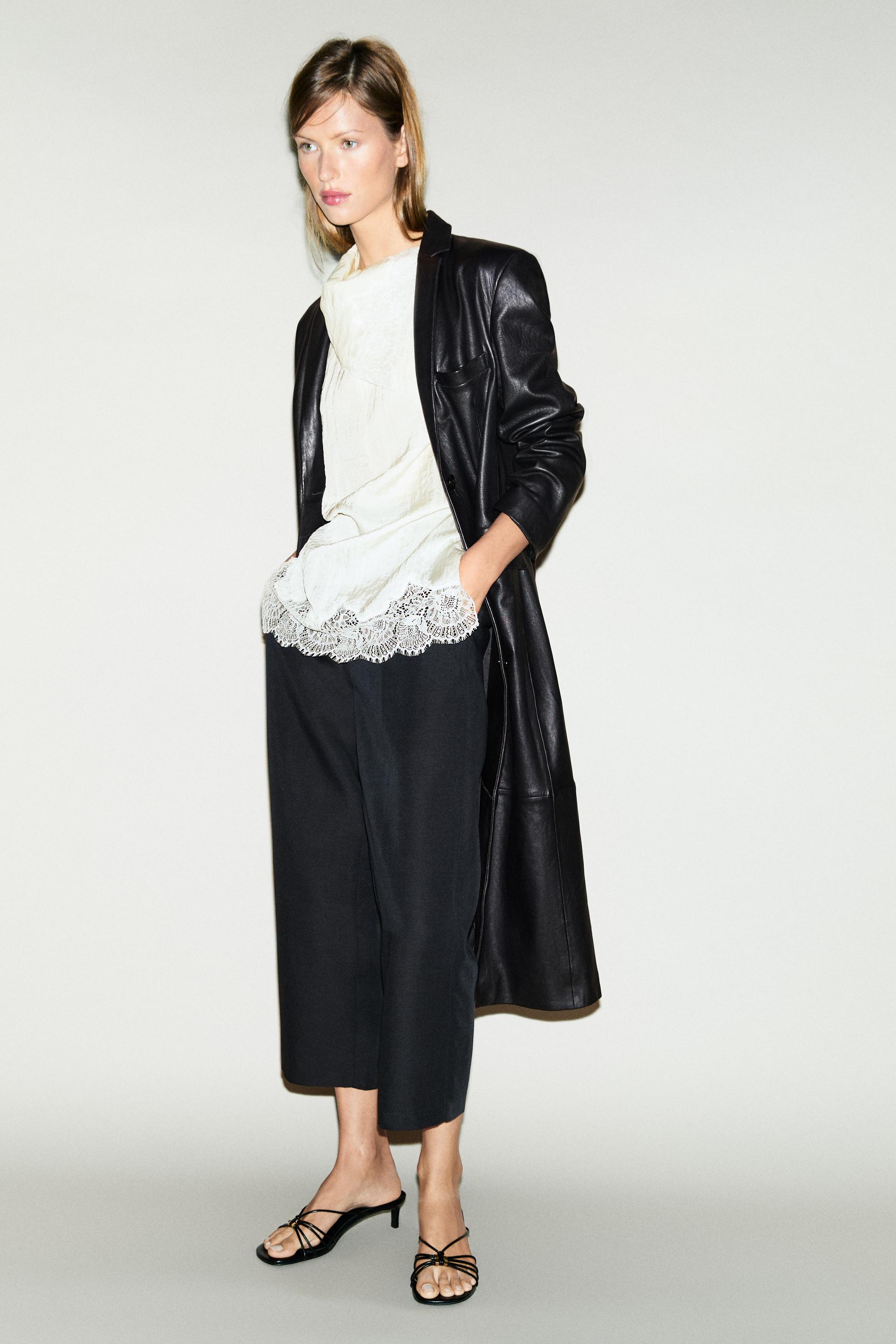 Asymmetric roll neck top with lace detail — CREAM
