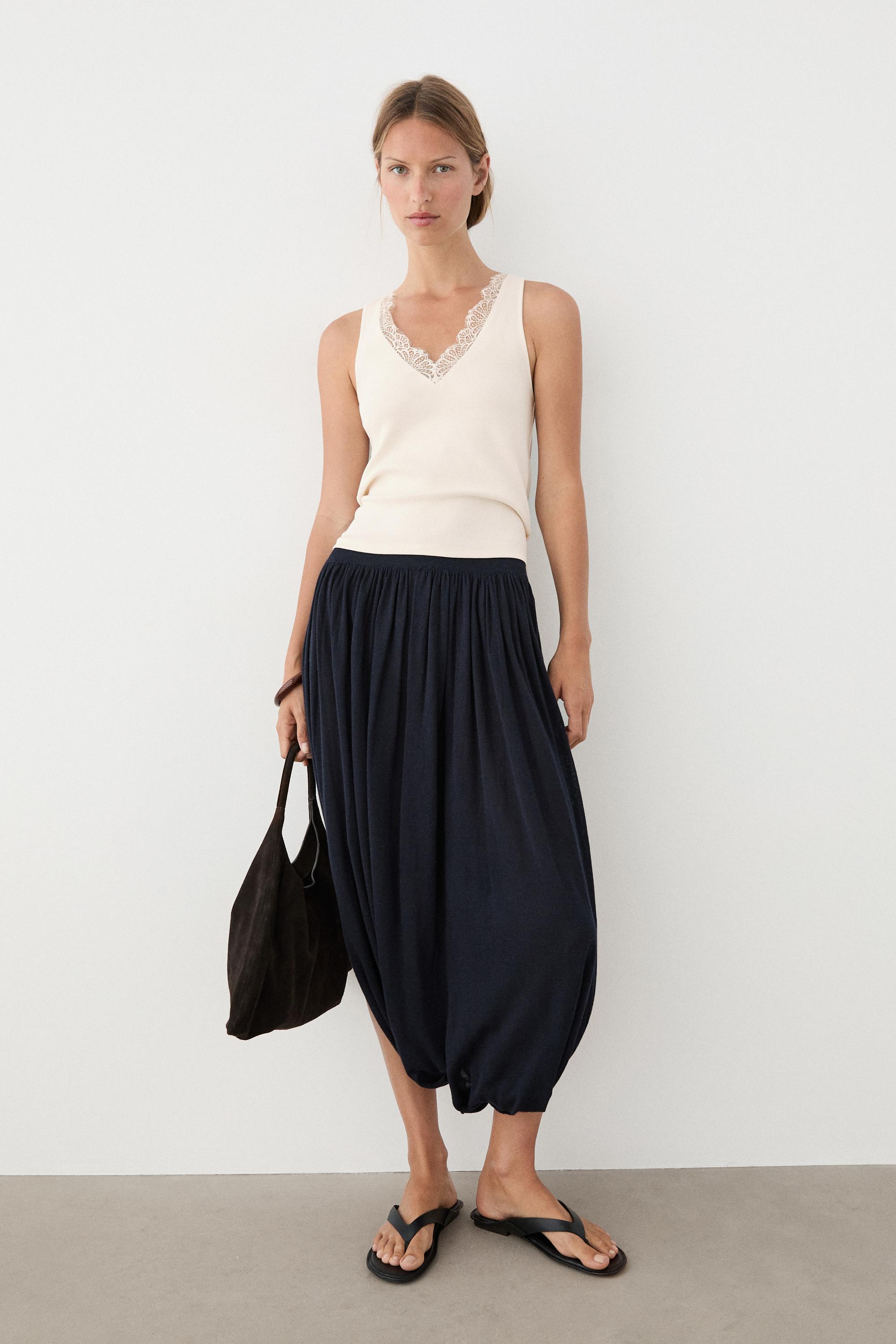 V-neck top with lace detail — CREAM