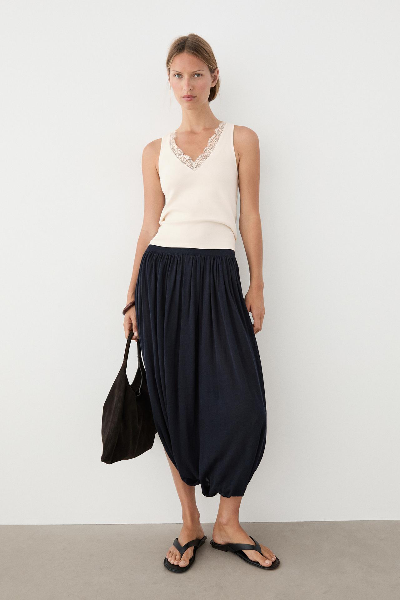 V-neck top with lace detail — CREAM