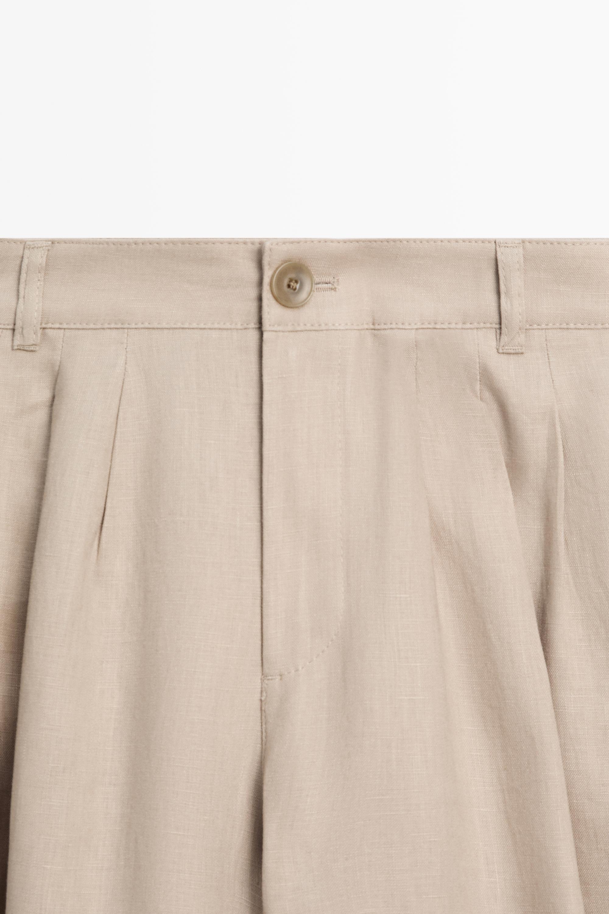 Wide-leg pleated linen trousers — STONE