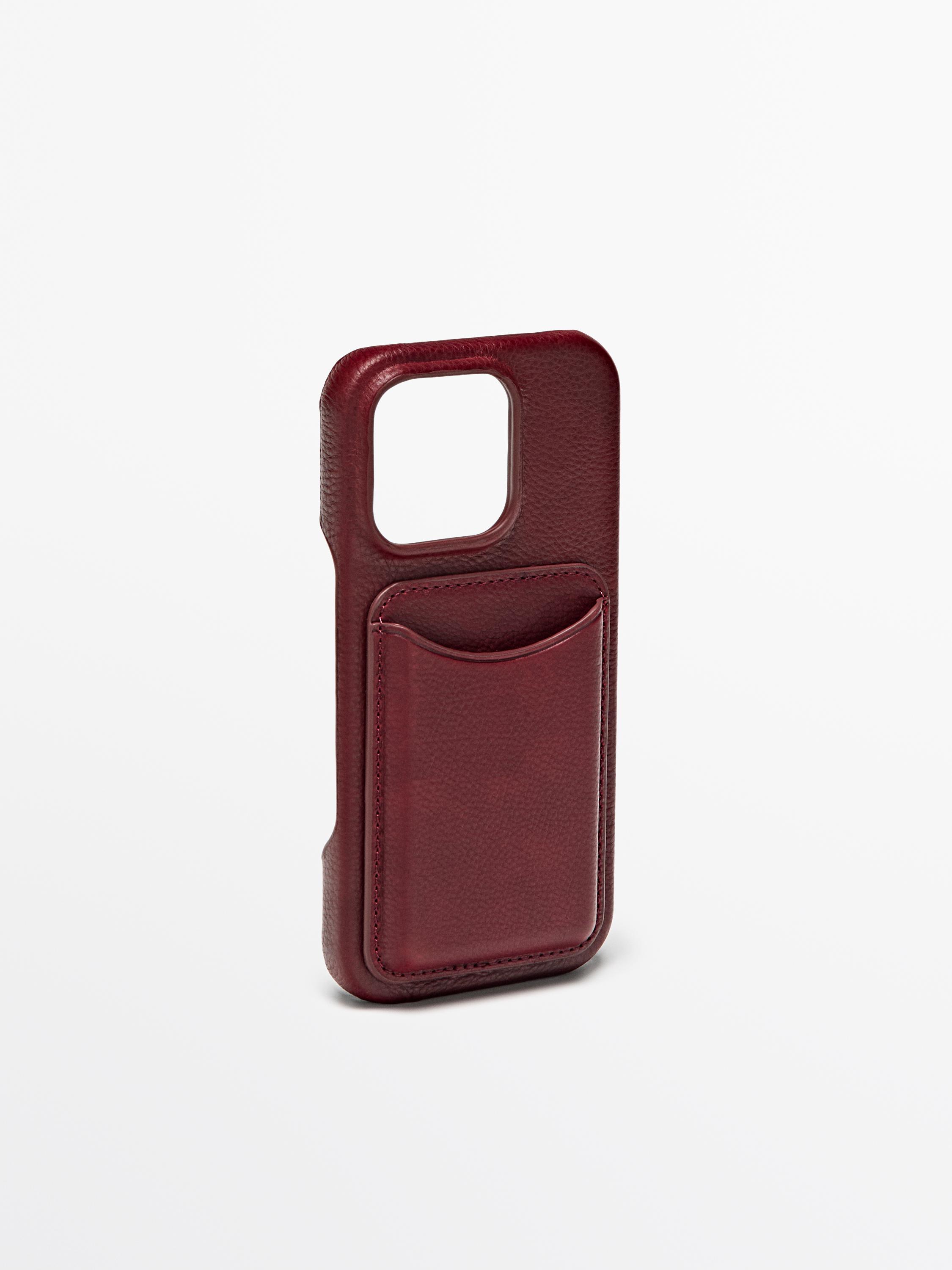 Red iPhone 16 Pro case with back pocket.