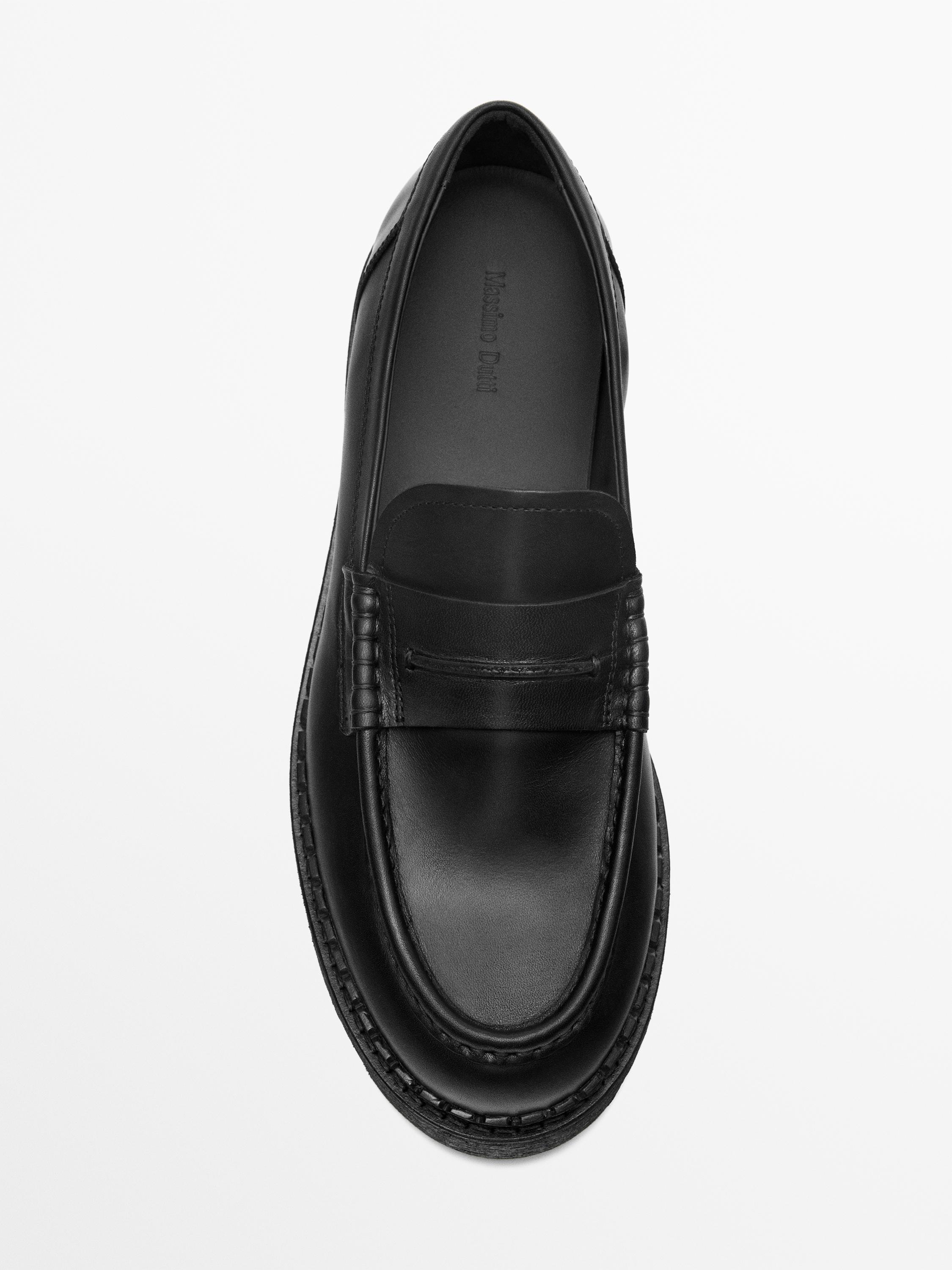 Leather track-sole loafers with penny strap — BLACK