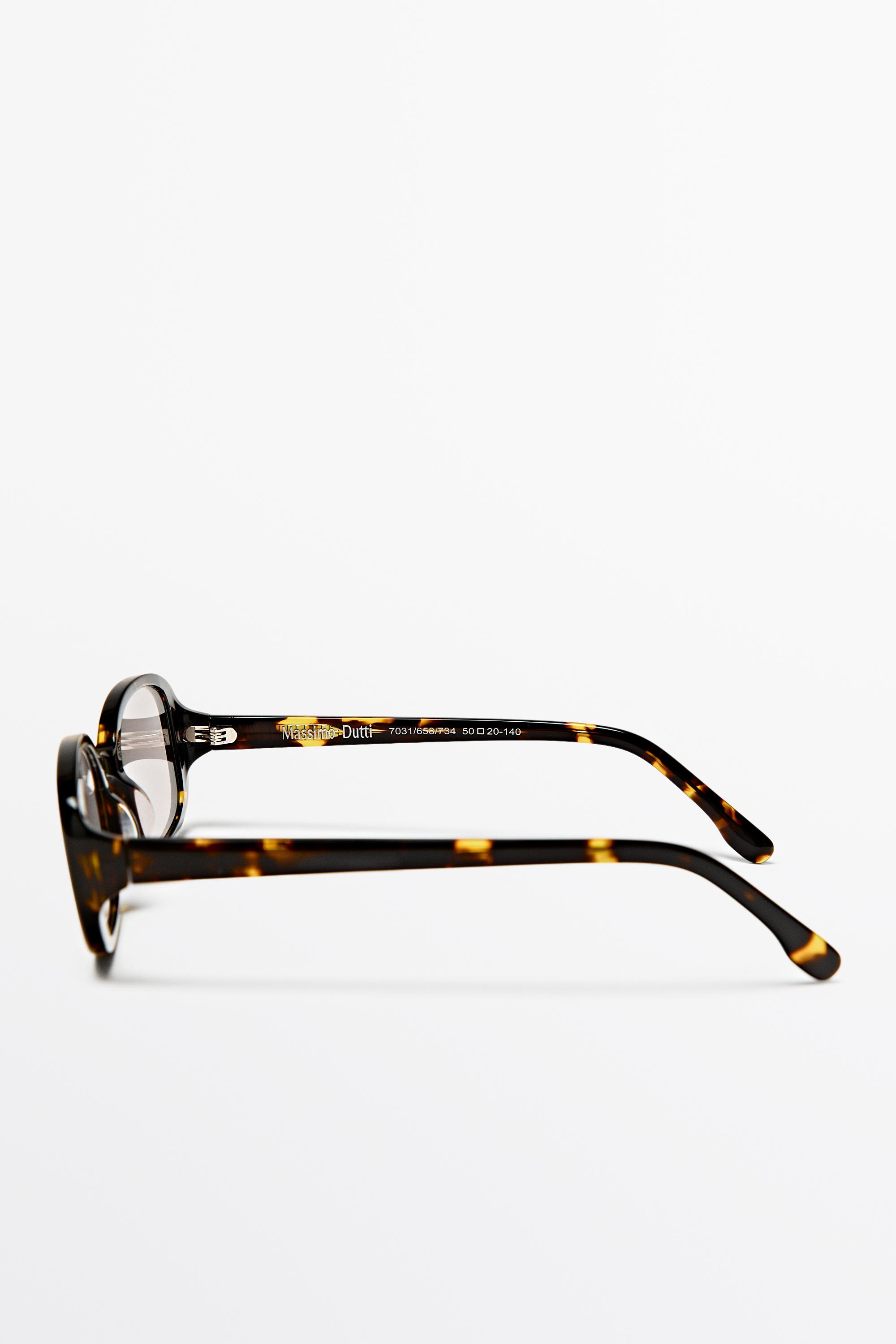 Oval tortoiseshell-effect sunglasses — BROWN