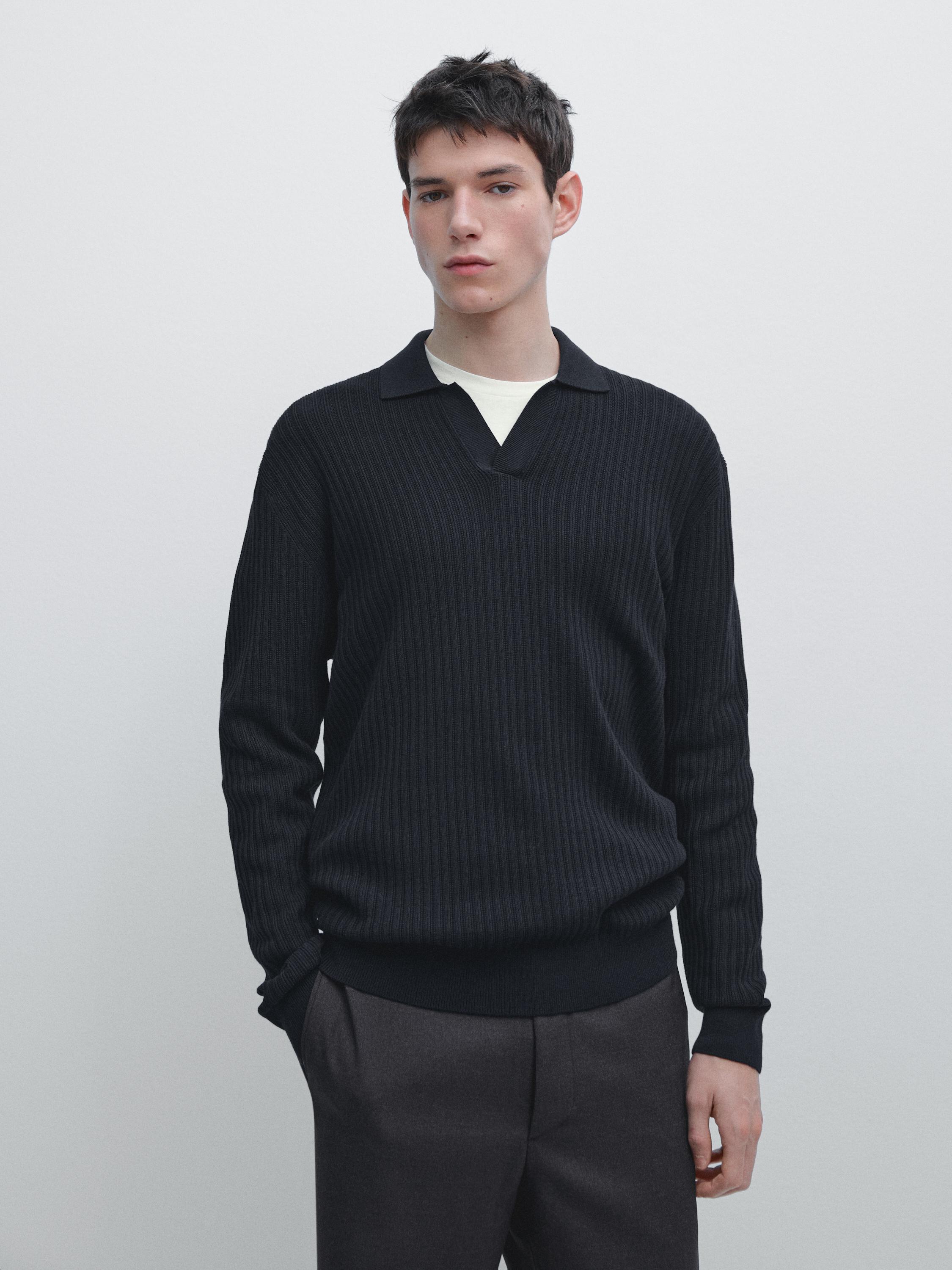 Navy blue knitted open-collar polo shirt and gray pants set.