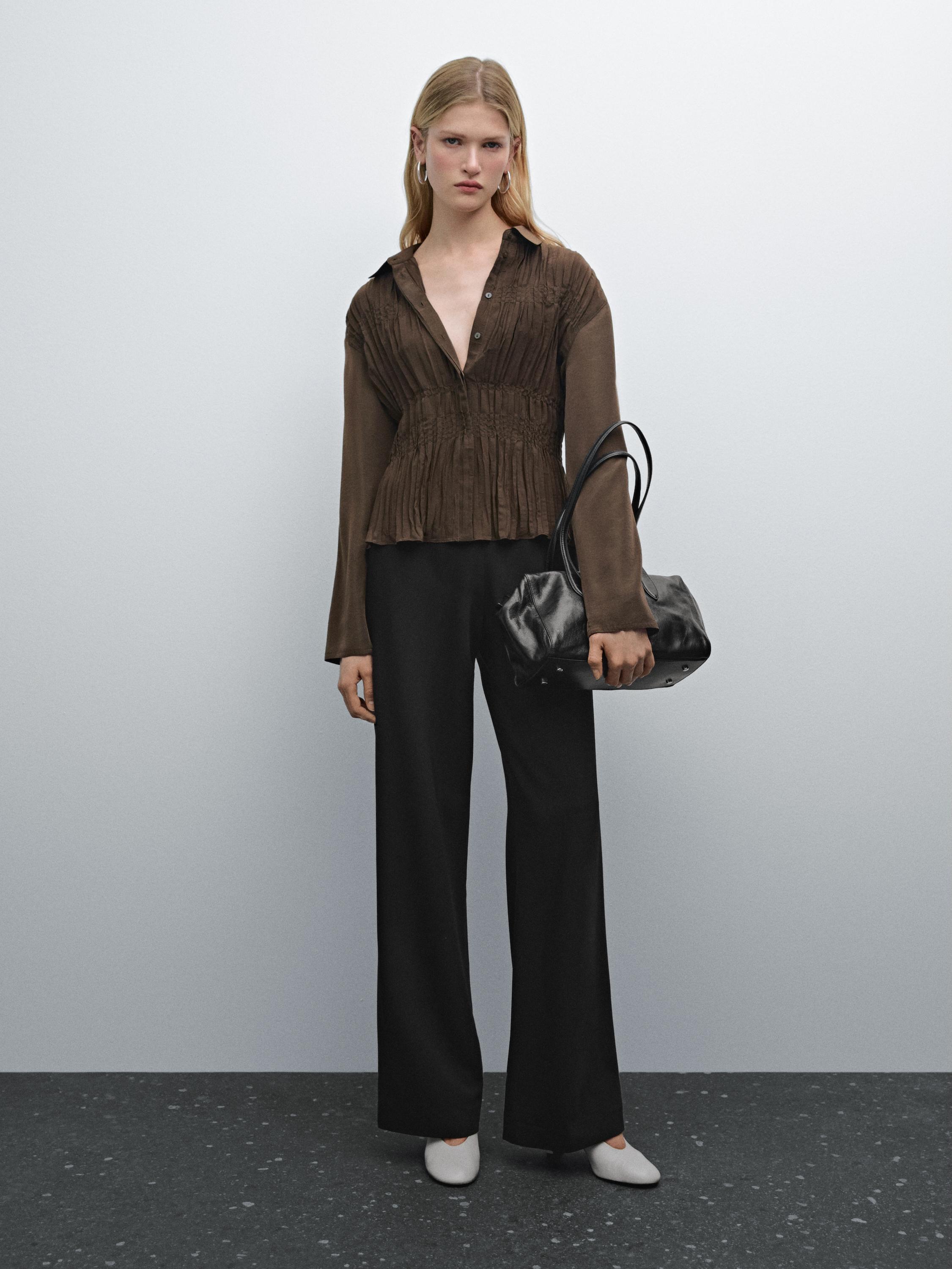 قميص فضفاض بتفاصيل بكشكش