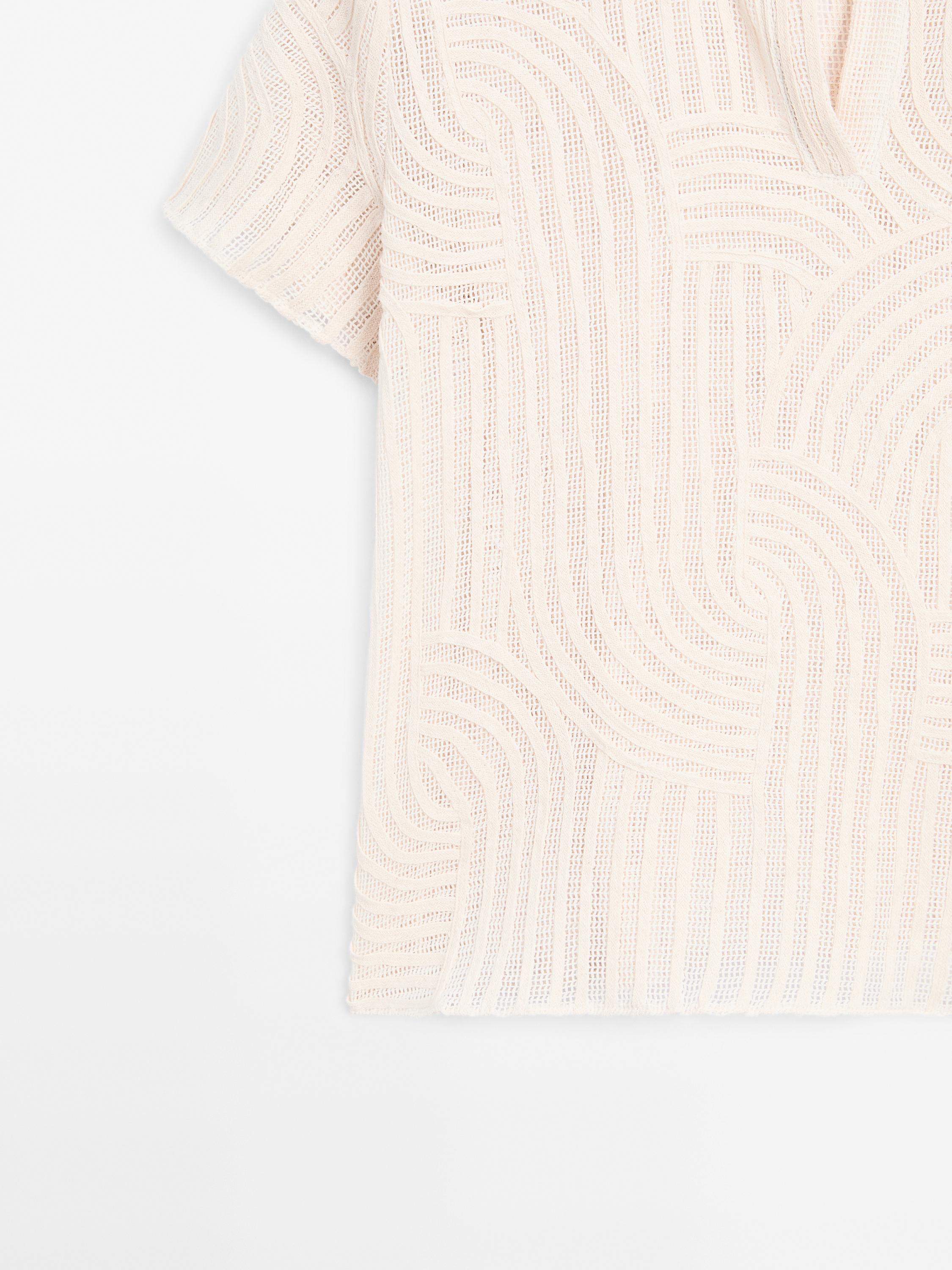 Cutwork polo shirt with embroidery