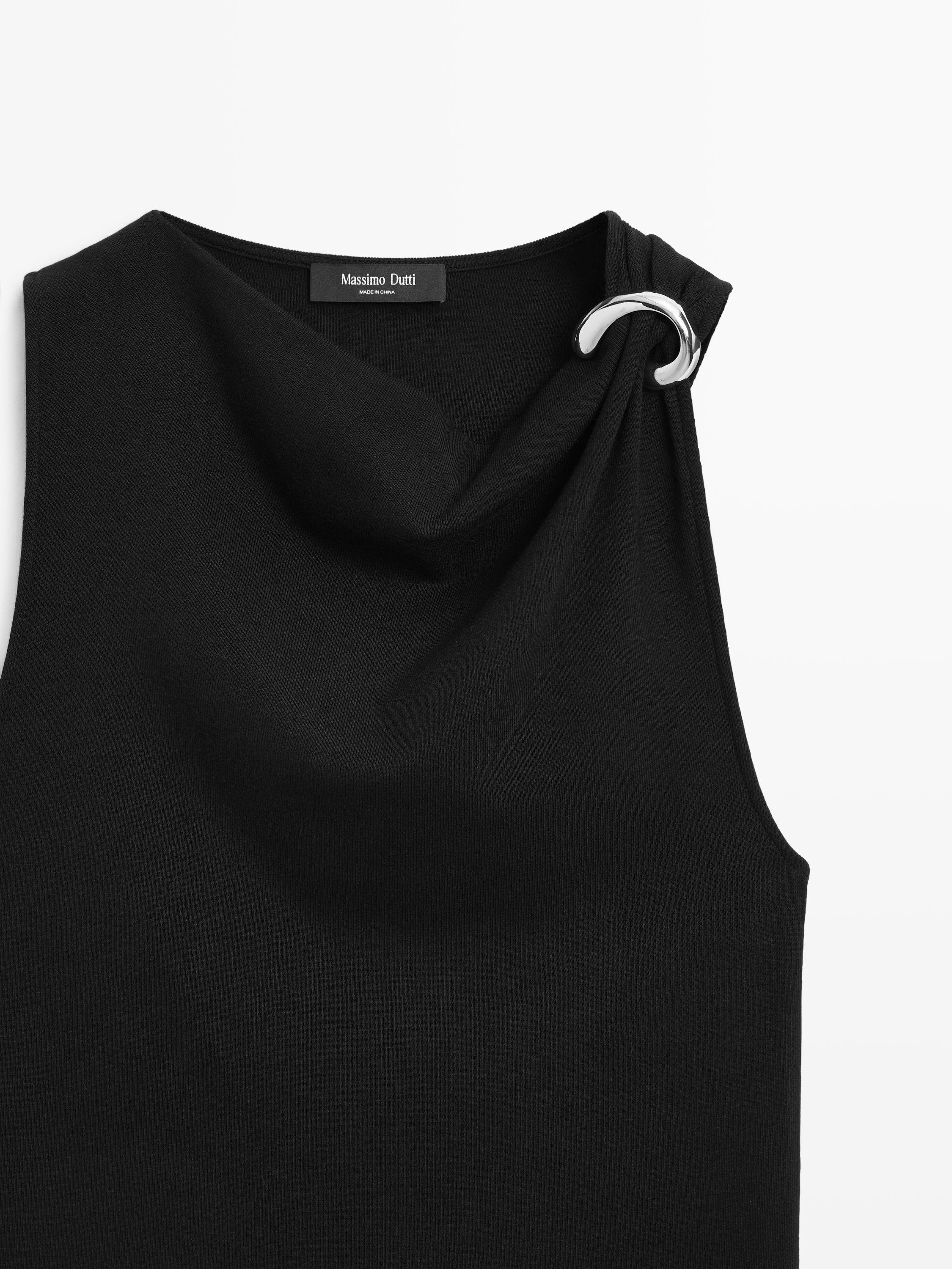 Draped neckline top with brooch detail
