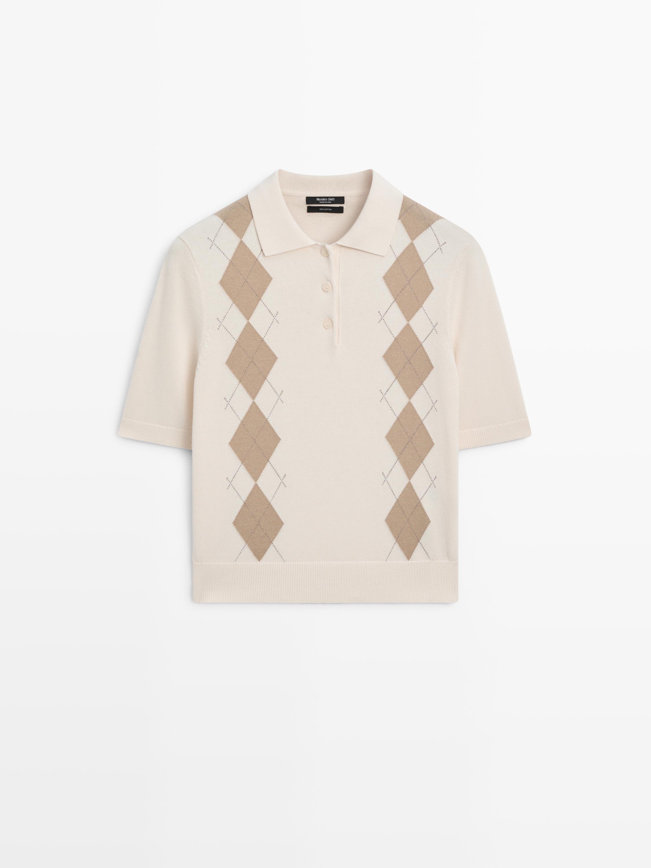 Front view of a beige polo neck sweater with a brown argyle pattern on the chest, short sleeves, and a front button placket.