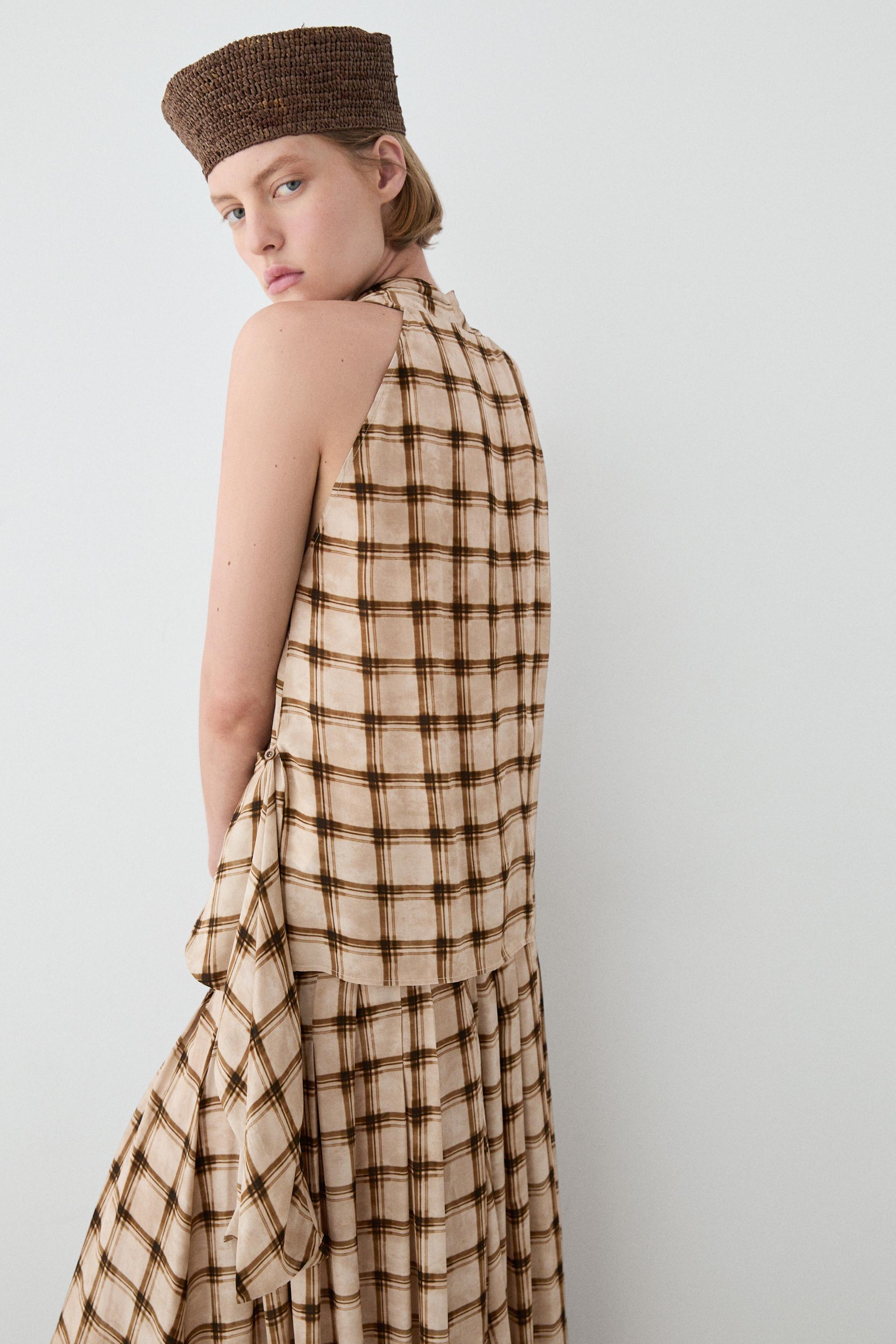 Flowing check print surplice top — BROWN